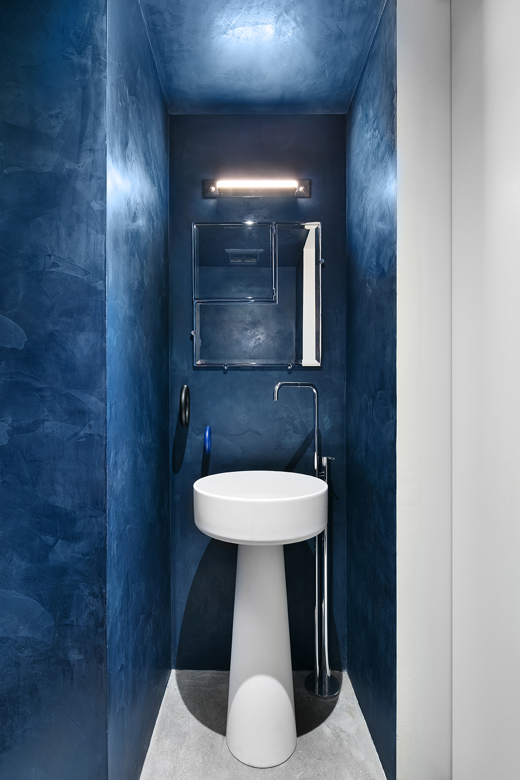 59 4th Avenue, Unit 2B Manhattan, NY 10003 - Photo 10 of 14 a bathroom with a sink and a mirror