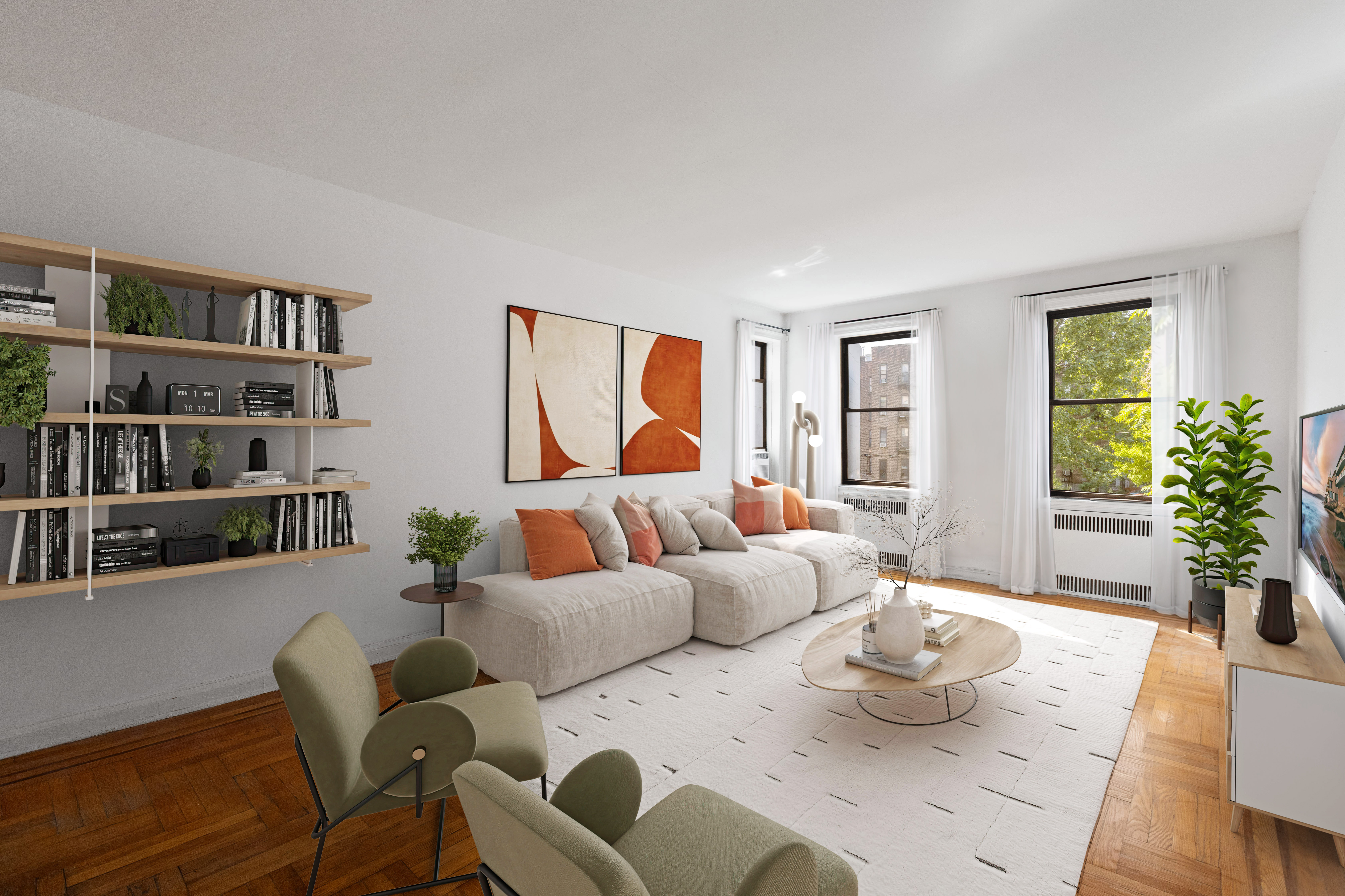 a living room with furniture and a potted plant
