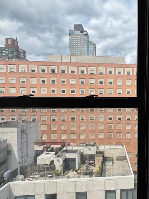 457 West 57th Street, Unit 1712 Manhattan, NY 10019 - Photo 5 of 9 a front view of a building