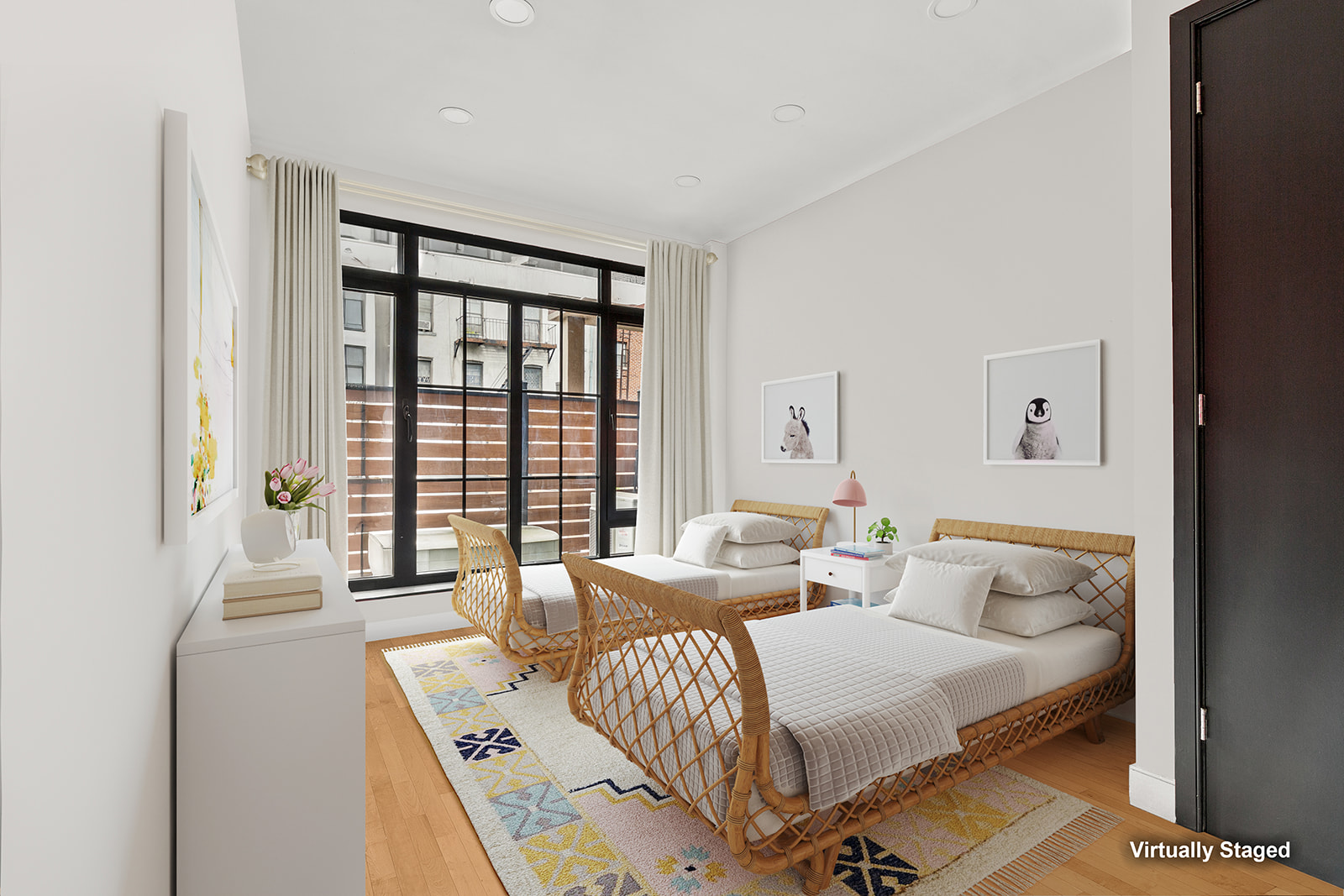 309 2nd Street, Unit 2F Brooklyn, NY 11215 - Photo 8 of 10 a bedroom with a bed and a large window