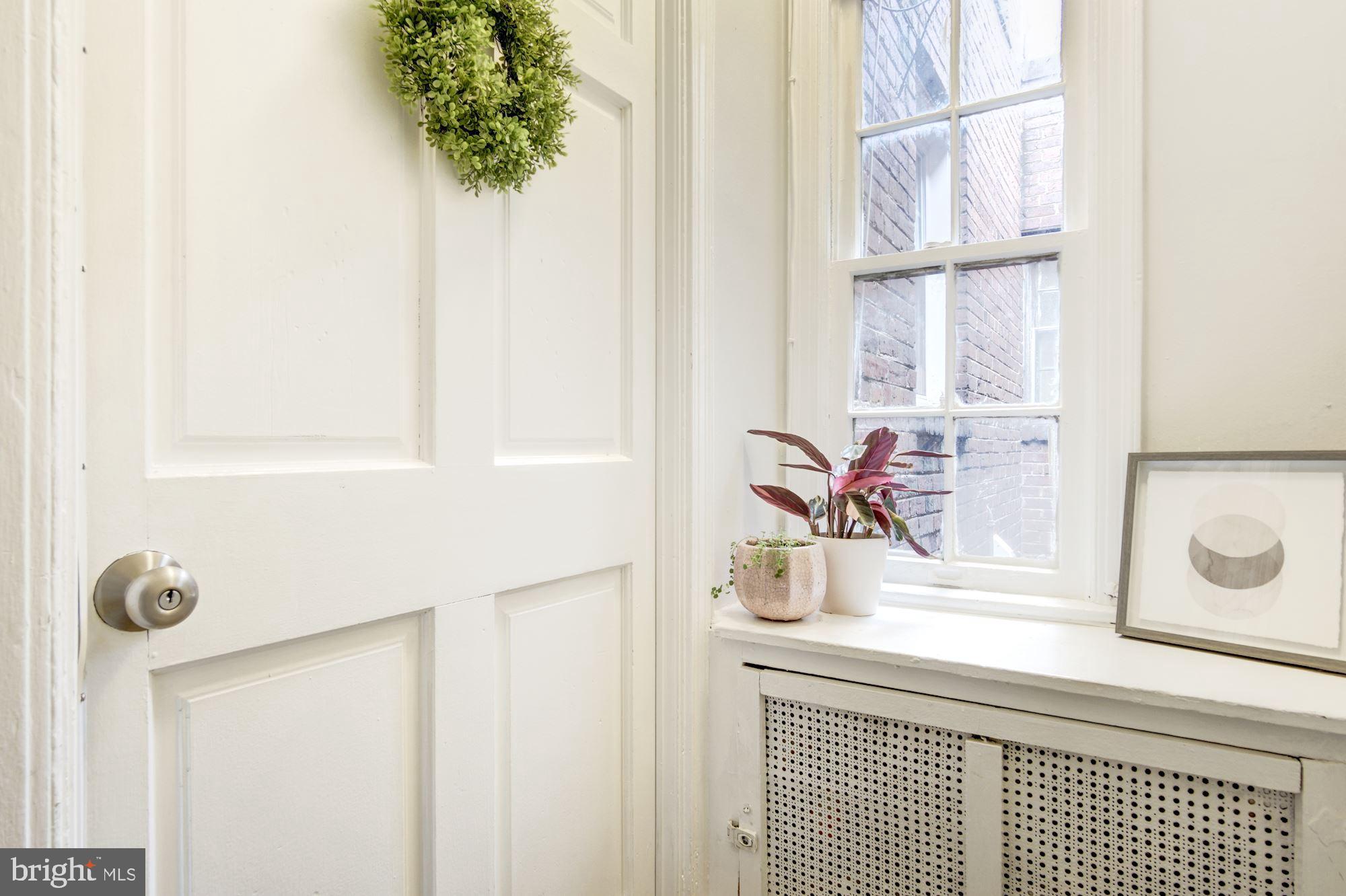 731 13th Street Northeast Washington, DC 20002 - Photo 4 of 43 a bathroom with a sink and a mirror