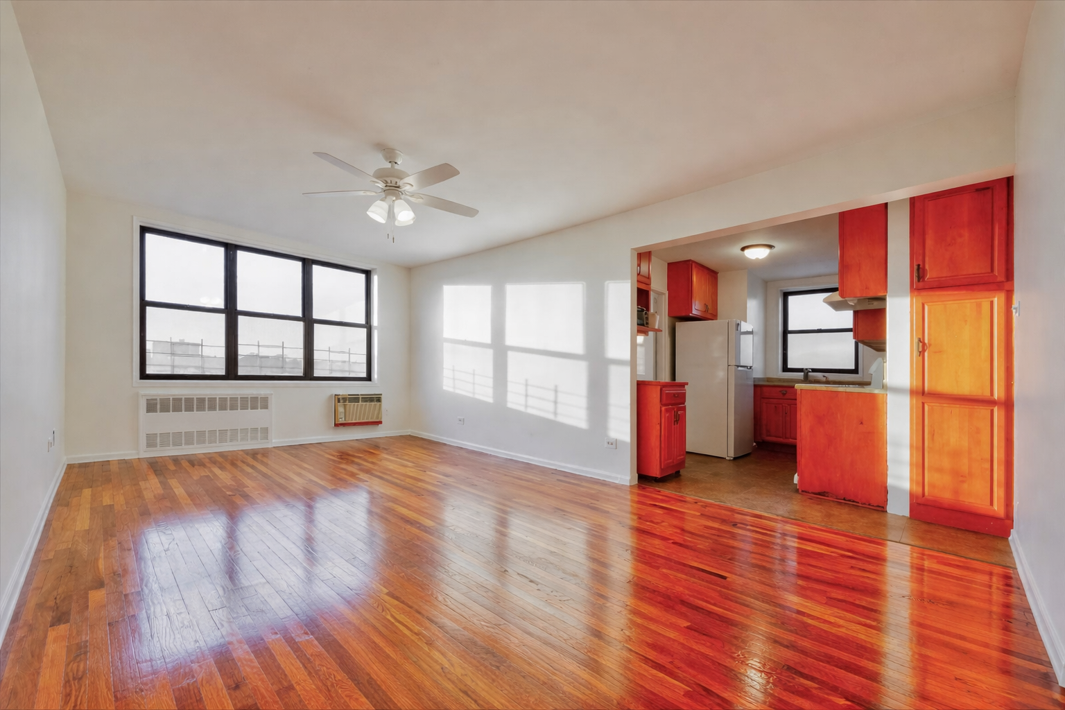 1270 East 51st Street, Unit 6X Brooklyn, NY 11234 - Photo 3 of 17 a view of a kitchen with wooden floor and a kitchen