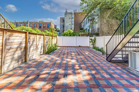 a view of a street from a balcony