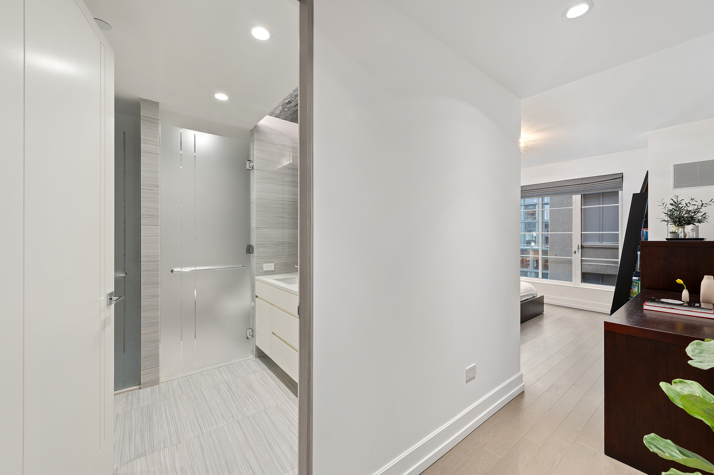 70 Charlton Street, Unit 16C Manhattan, NY 10014 - Photo 11 of 31 a bathroom with a sink and a toilet
