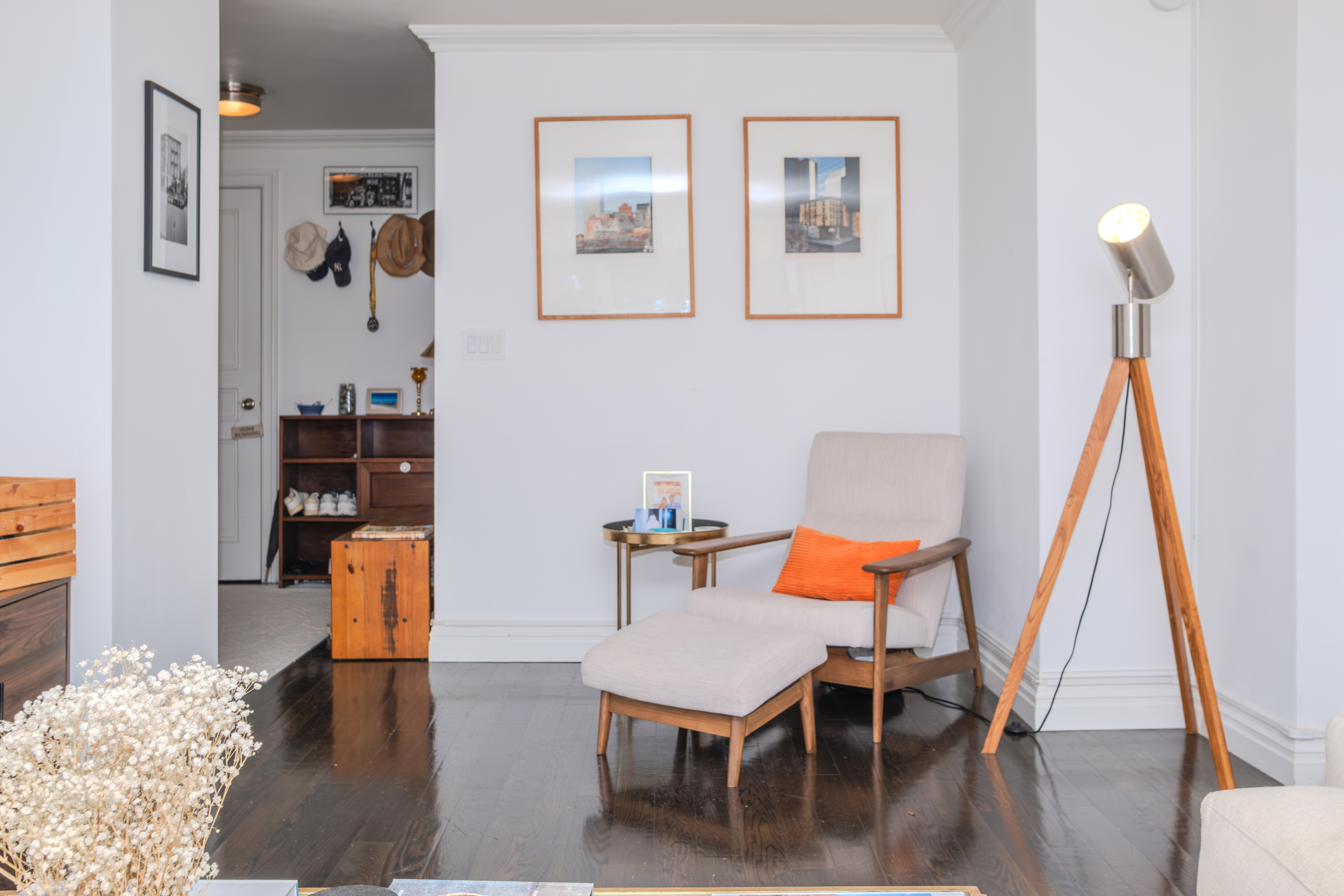 31 Jane Street, Unit 9AB Manhattan, NY 10014 - Photo 2 of 14 a living room with dining room and wooden floor