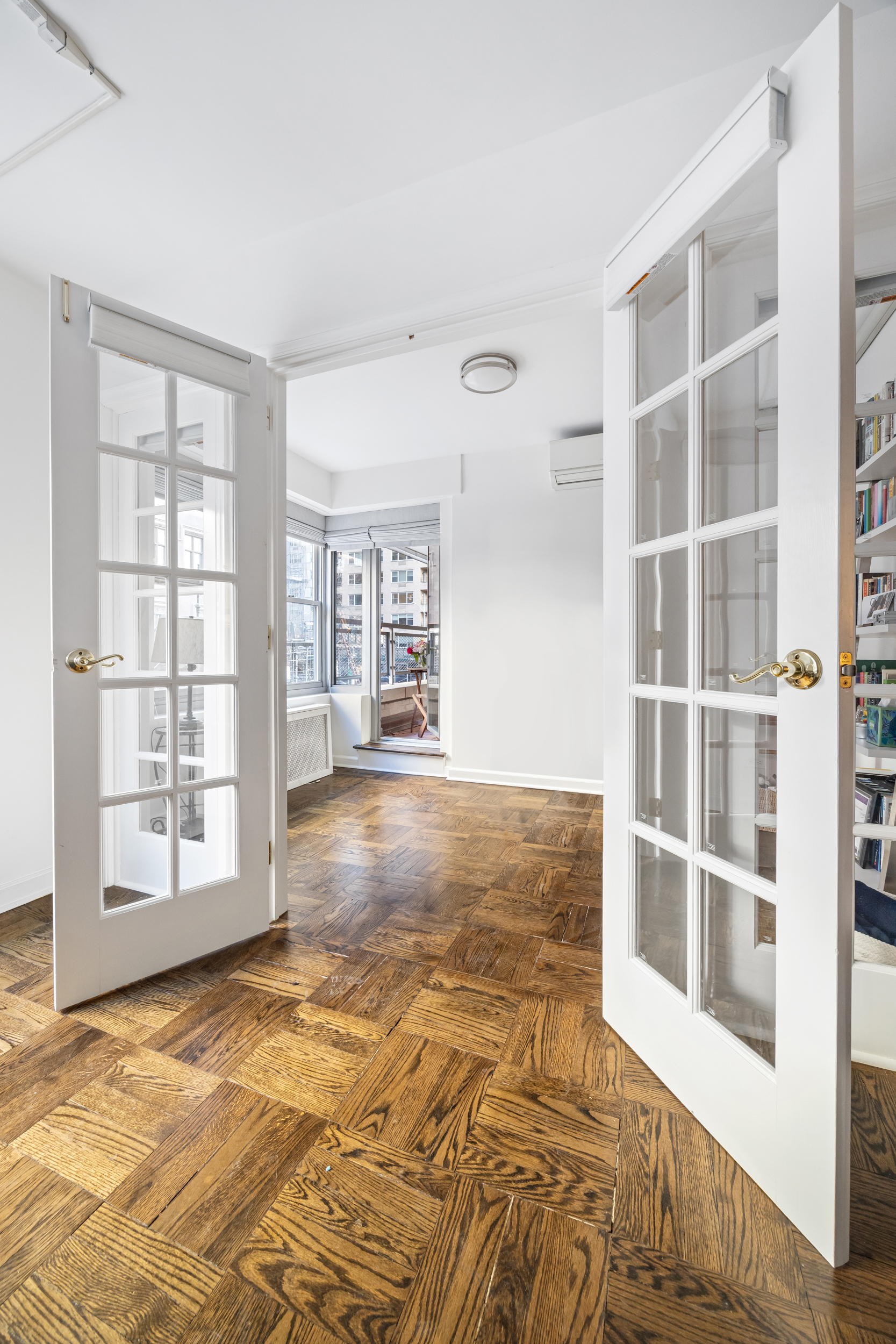 2 5th Avenue, Unit 2R Manhattan, NY 10011 - Photo 4 of 12 a view of an empty room with a window