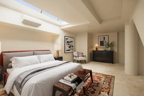 a bedroom with a bed and furniture