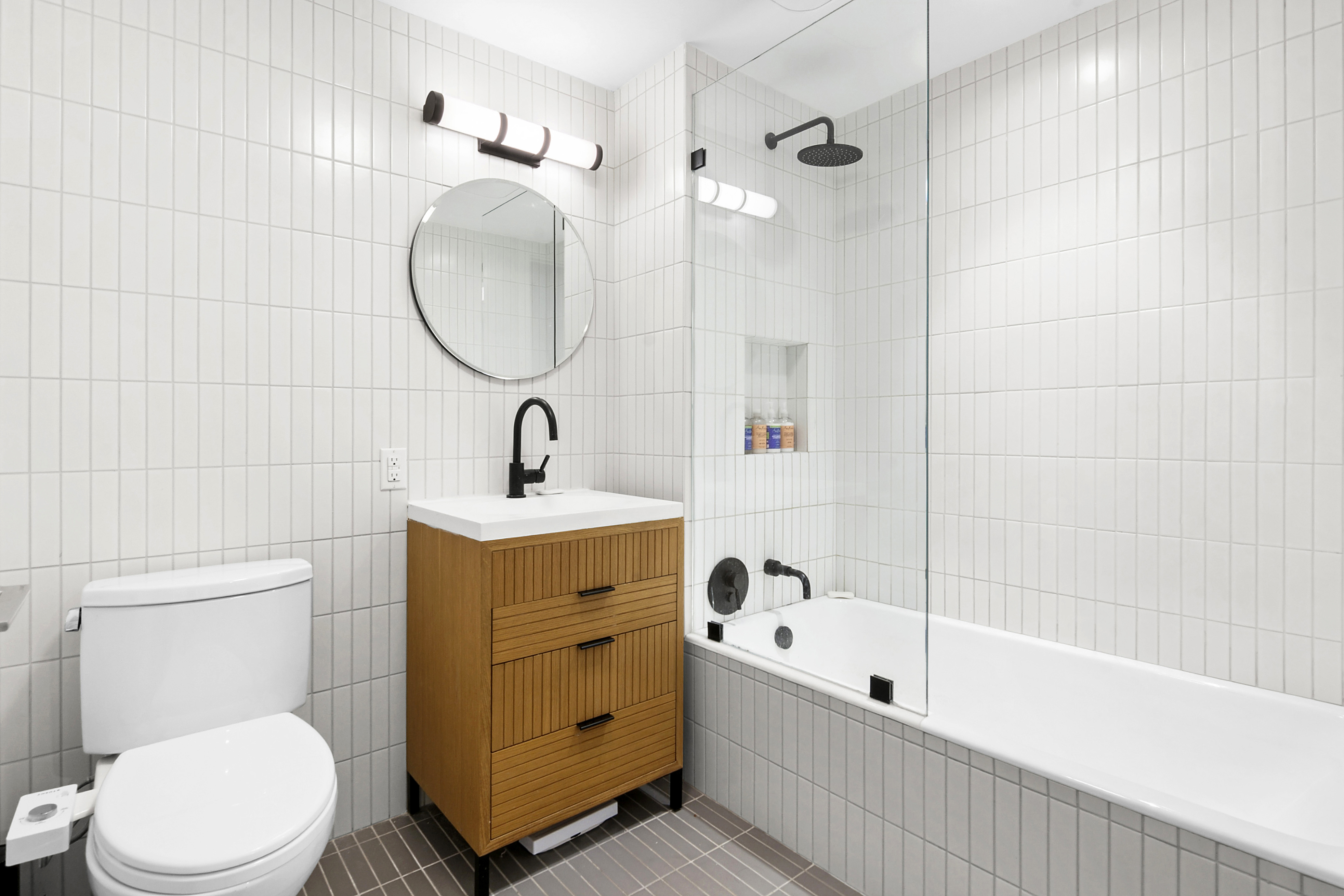 111 Montgomery Street, Unit 7CC Brooklyn, NY 11225 - Photo 5 of 18 a bathroom with a sink toilet and shower