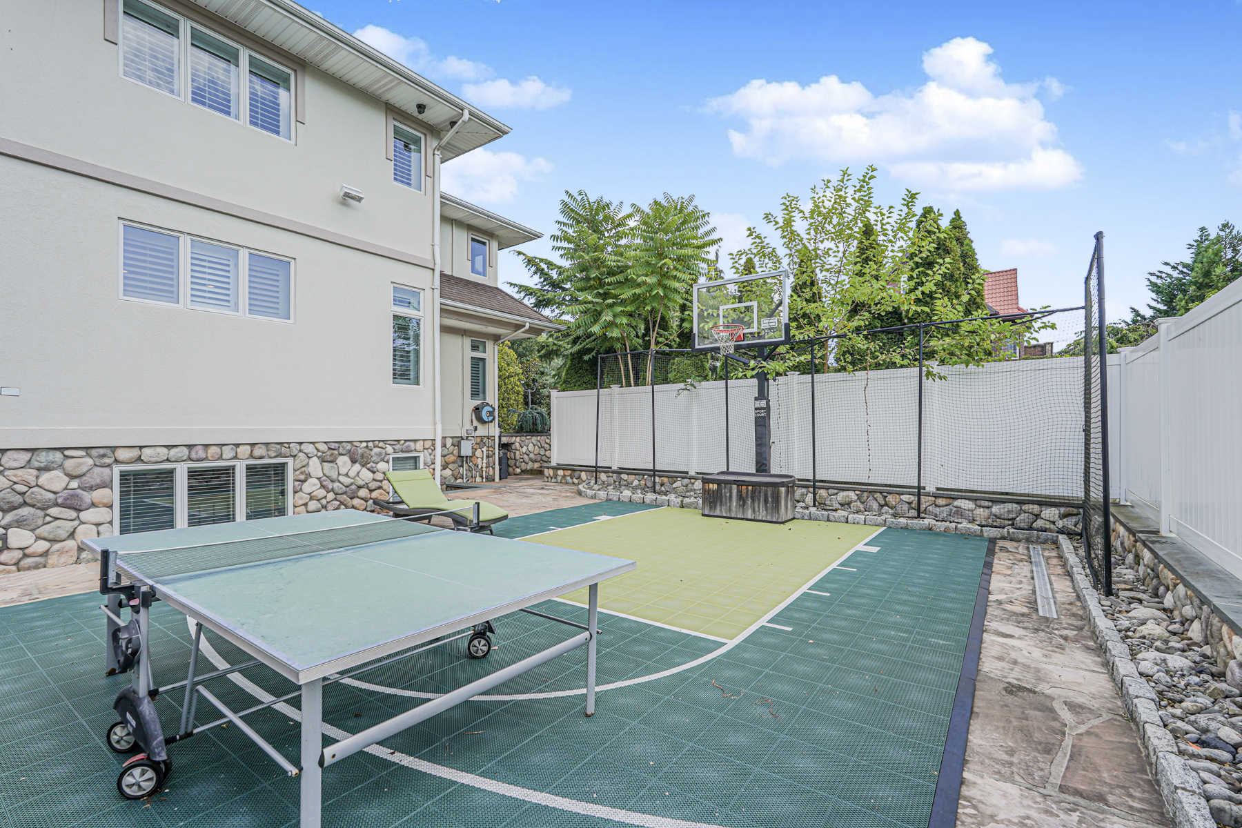 165 Swaim Avenue Staten Island, NY 10312 - Photo 23 of 45 a view of a patio with table and chairs and potted plants with wooden floor