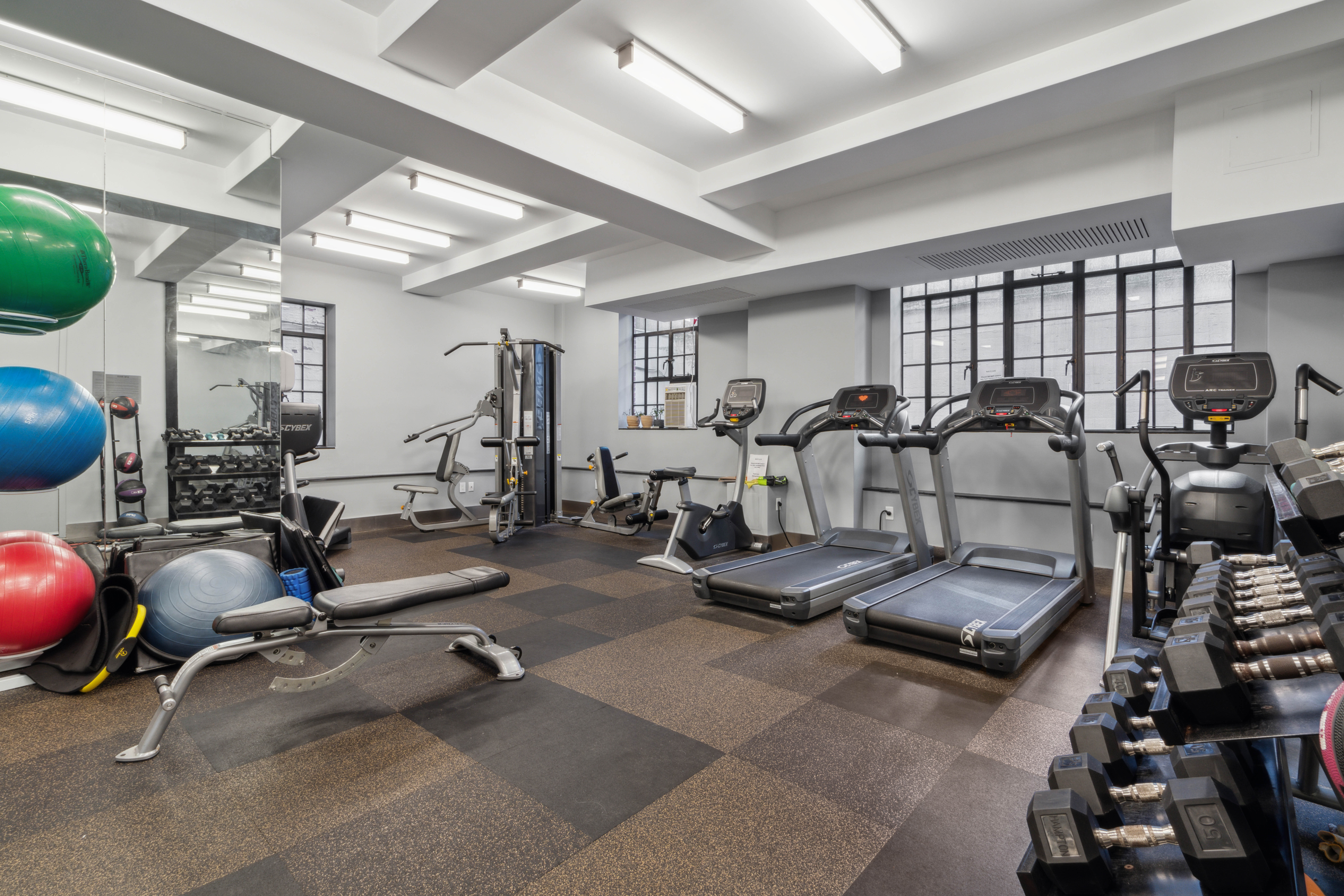 25 Monroe Place, Unit 1C Brooklyn, NY 11201 - Photo 8 of 14 a view of a room with gym equipment
