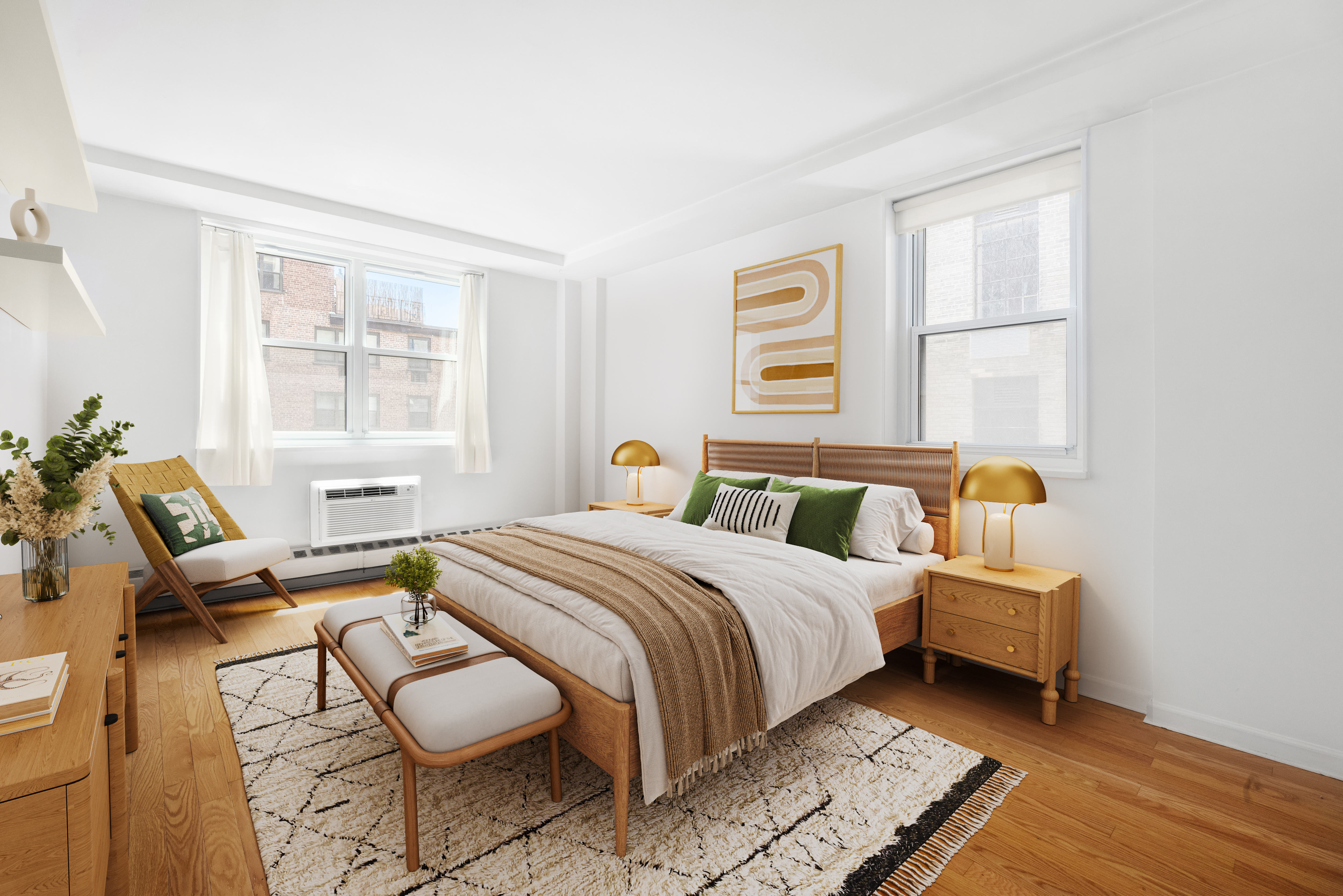 63 East 9th Street, Unit 6F Manhattan, NY 10003 - Photo 5 of 9 a bedroom with a bed and wooden floor