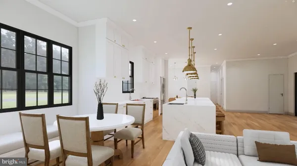 a living room with furniture a window and a chandelier