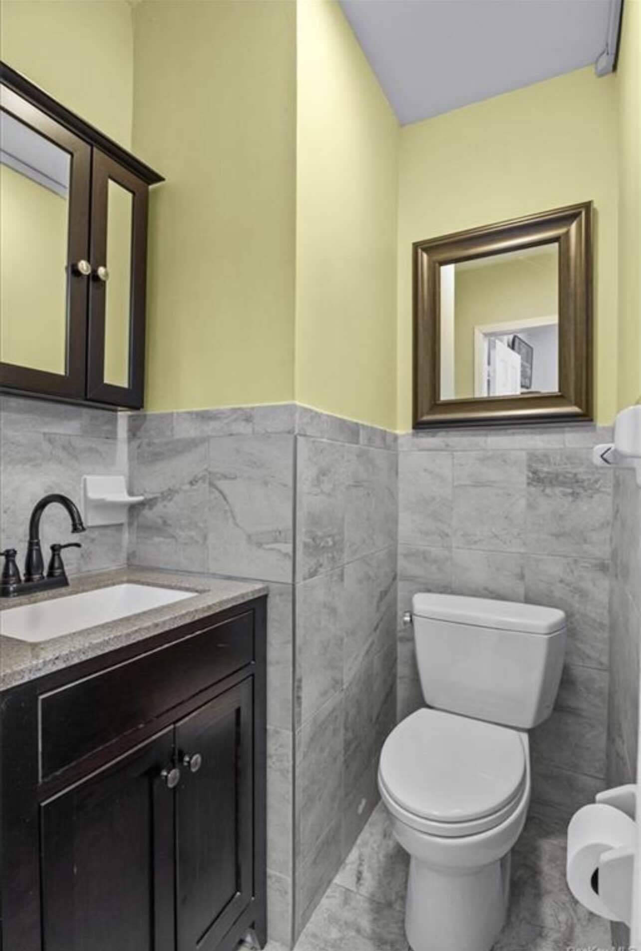 3194 Webster Avenue Bronx, NY 10467 - Photo 22 of 23 a bathroom with a toilet sink and mirror