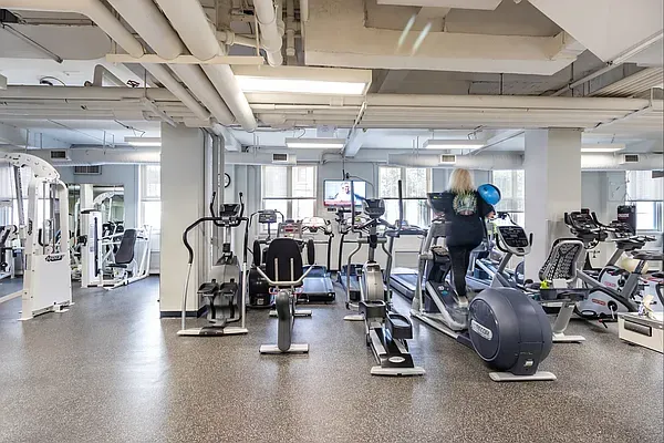 a view of a room with gym equipment