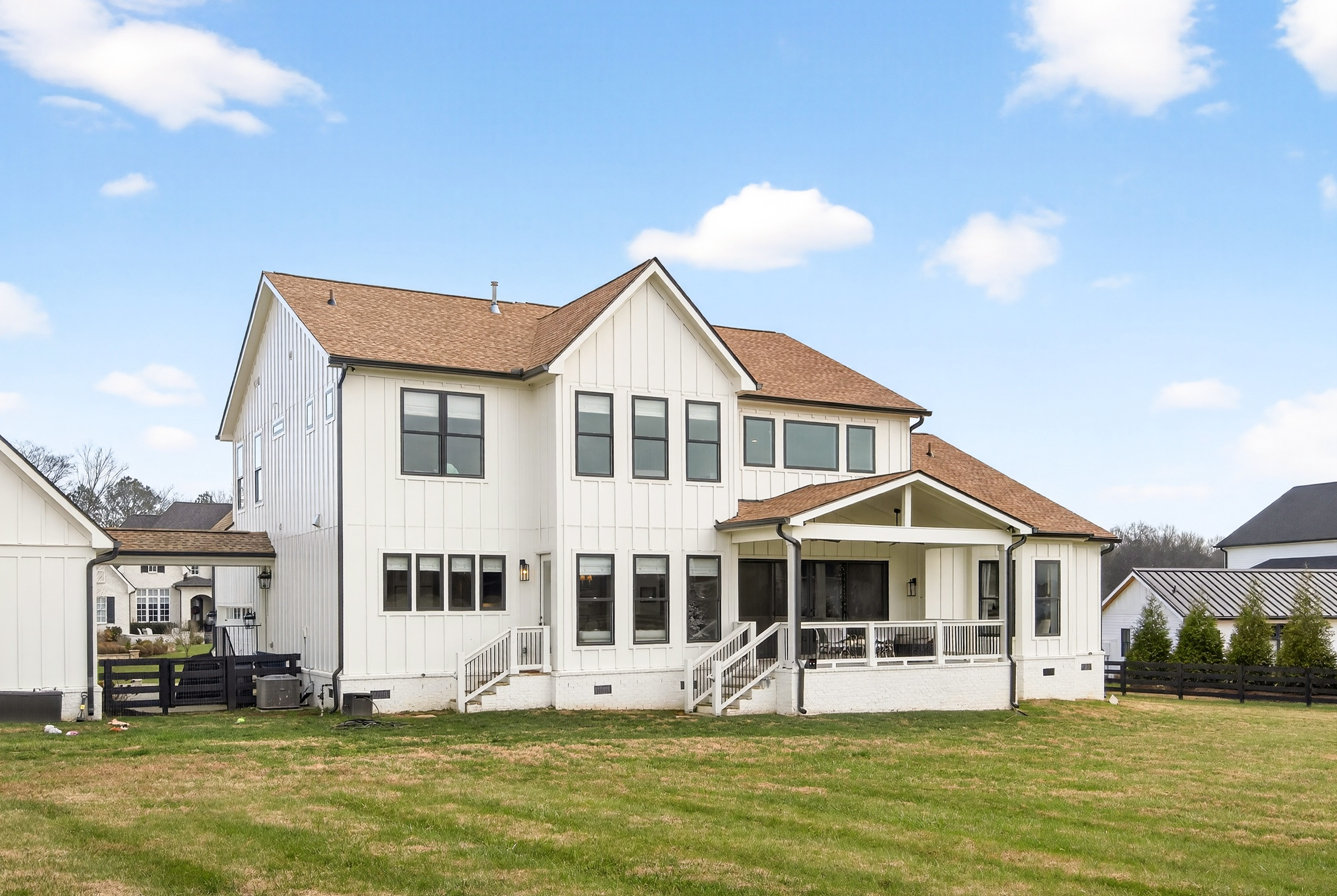 1703 Swansons Rdg Drive Franklin, TN 37064 - Photo 4 of 67 a front view of a house with a yard table and chairs