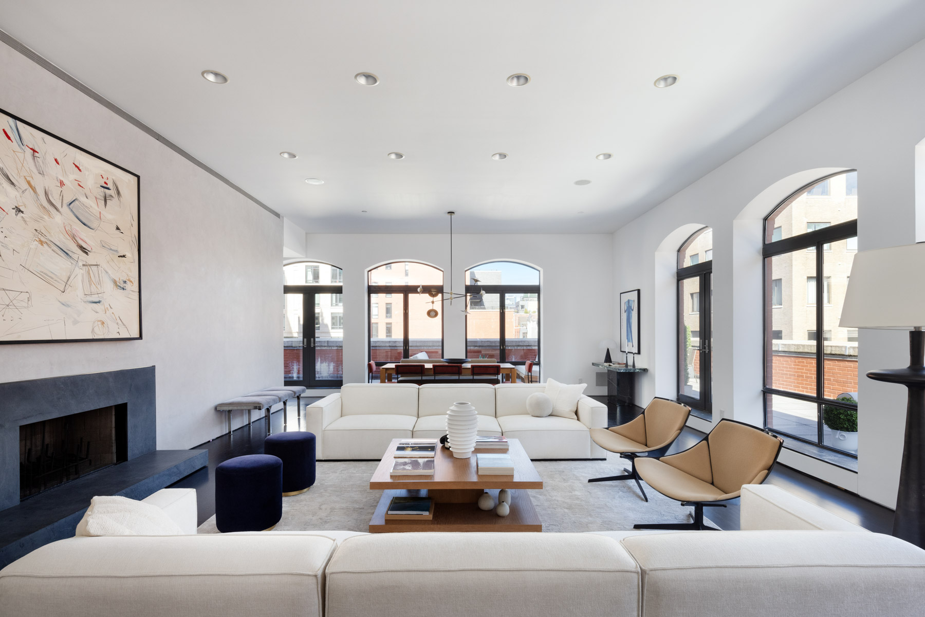 92 Laight Street, Unit PHC Manhattan, NY 10013 - Photo 5 of 16 a living room with furniture and a large window