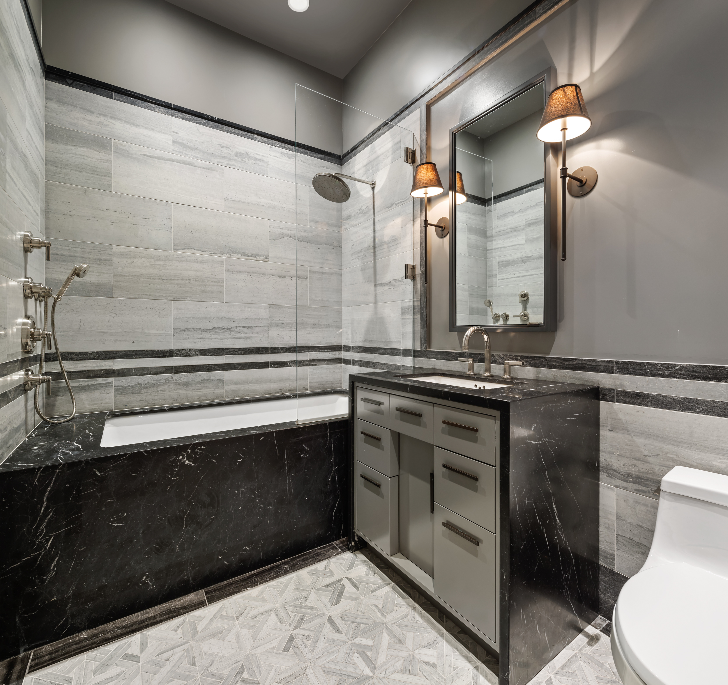 114 Liberty Street, Unit 2A Manhattan, NY 10006 - Photo 15 of 17 a bathroom with a sink and a mirror