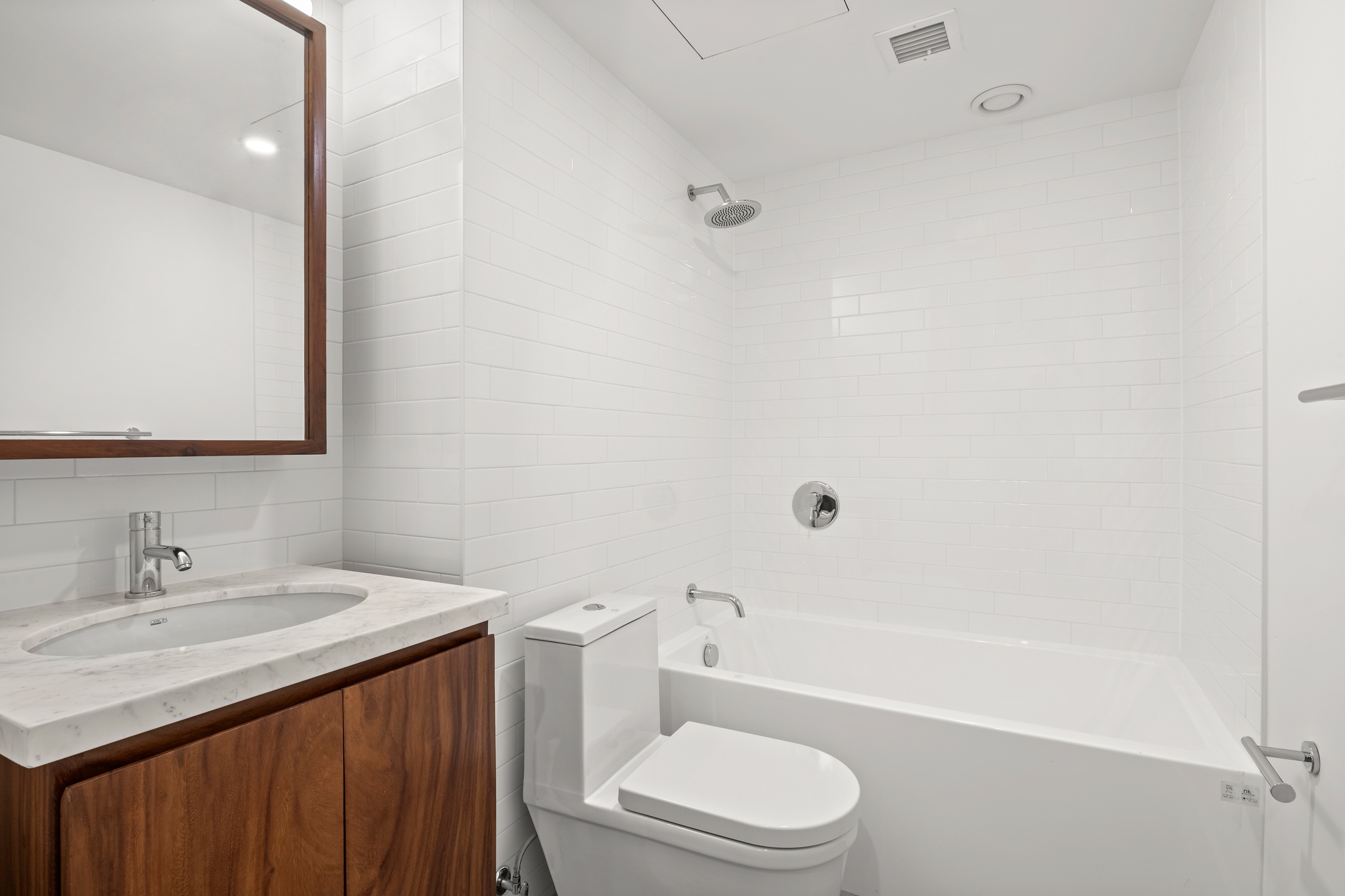 277 Greene Avenue, Unit B Brooklyn, NY 11238 - Photo 12 of 13 a bathroom with a sink a toilet and shower