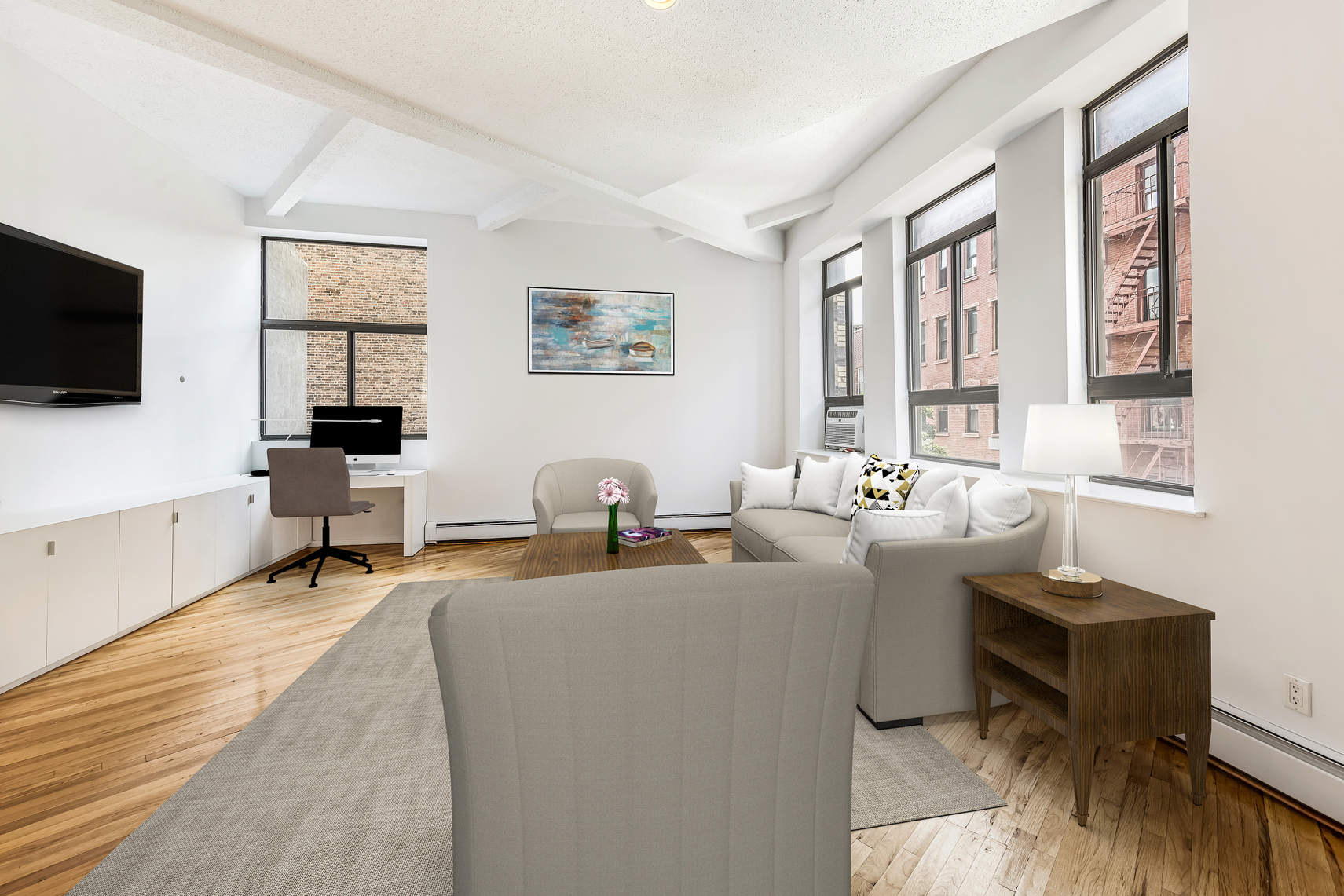 2 Cornelia Street, Unit 306 Manhattan, NY 10014 - Photo 3 of 13 a living room with fireplace furniture and a flat screen tv