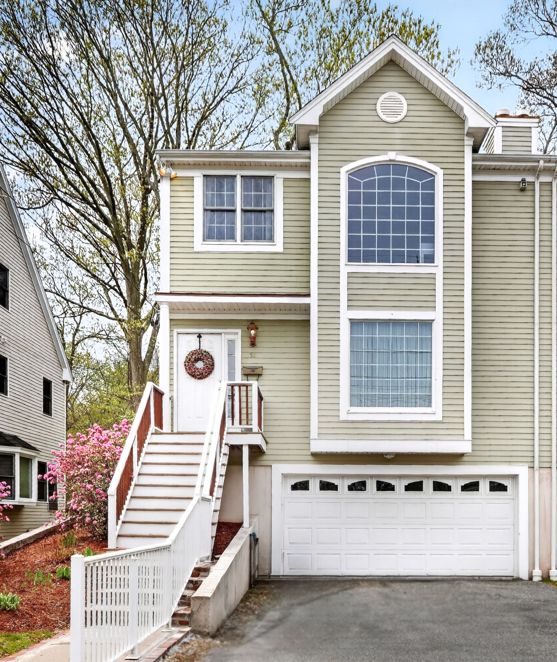 58 Tanglewood Road Newton Center, MA 02459 - Photo 5 of 33 a front view of a house with a yard