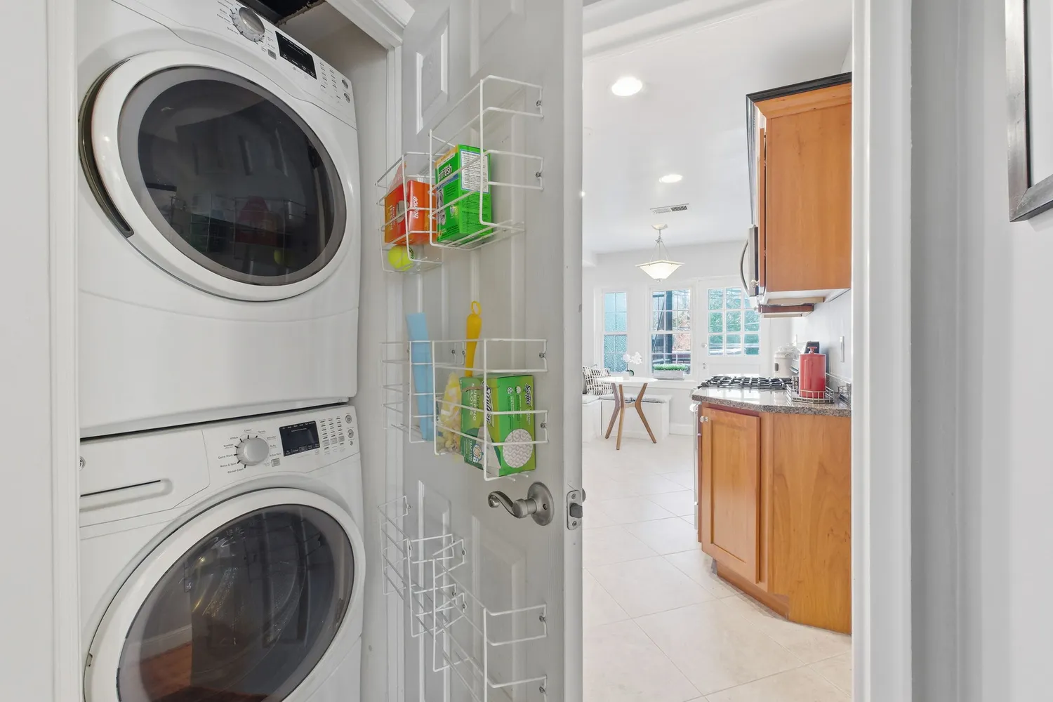 a view of a kitchen with washer and dryer