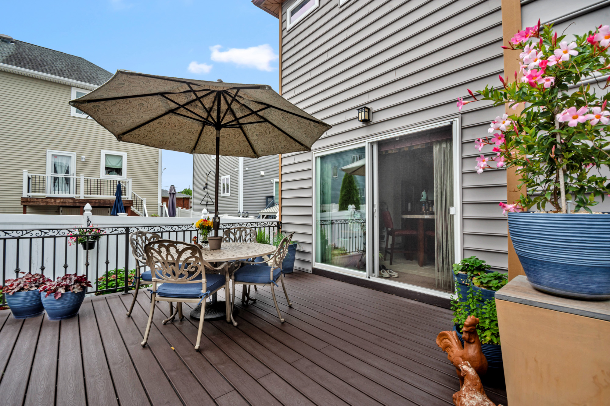 909 Jewett Avenue Staten Island, NY 10314 - Photo 62 of 65 a view of balcony with outdoor seating and wooden floor
