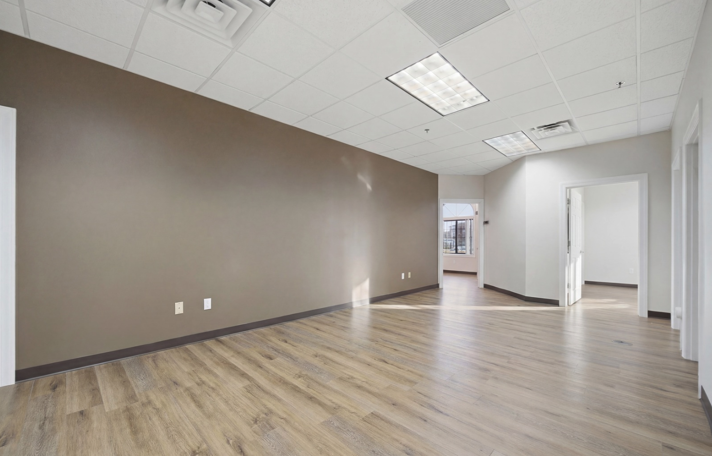 6475 Washington Street Gurnee, IL 60031 - Photo 35 of 45 a view of an empty room with wooden floor and a window
