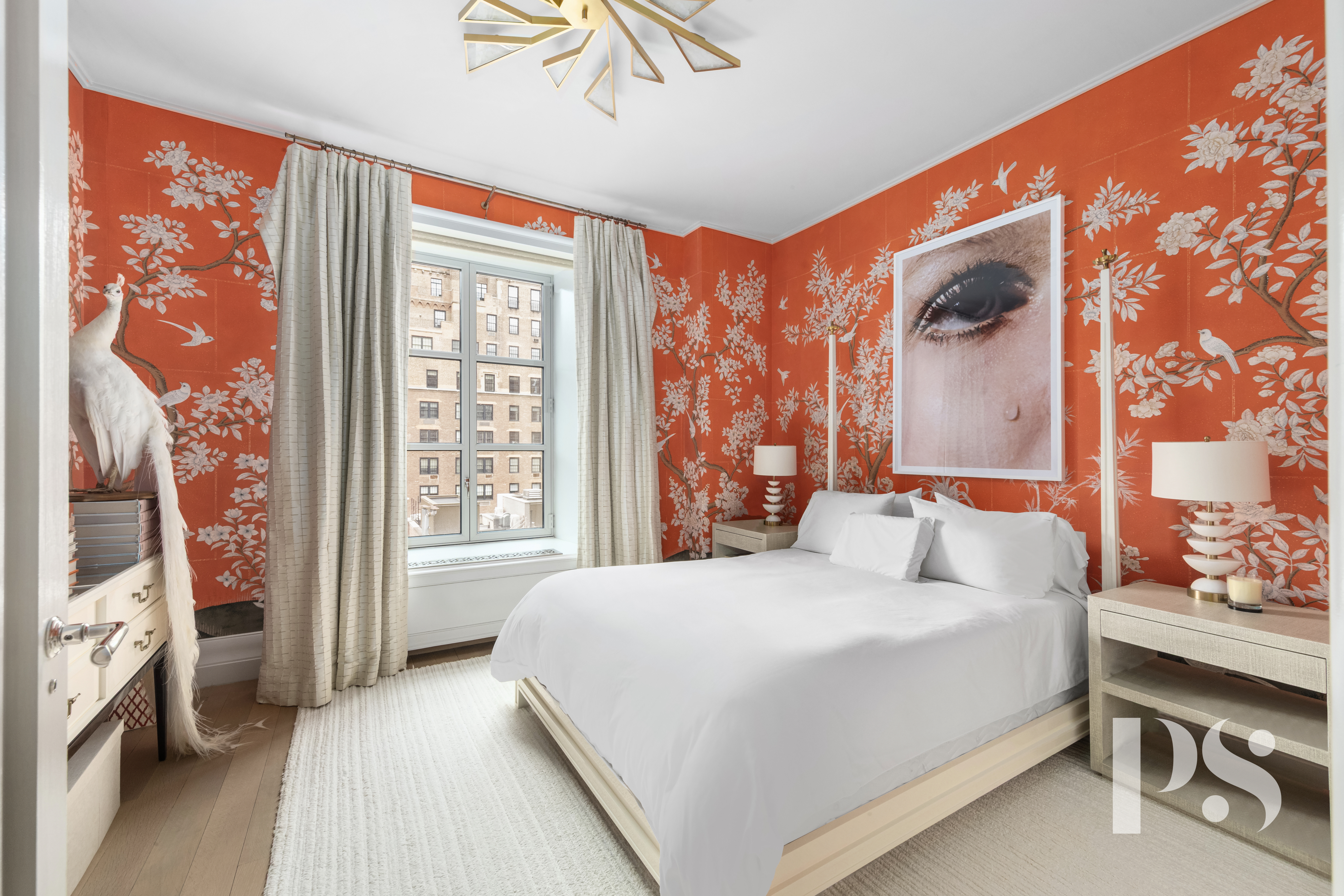 135 East 79th Street, Unit 8E Manhattan, NY 10075 - Photo 18 of 26 a bedroom with a large bed and a window