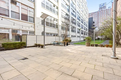 a view of a building with a bench