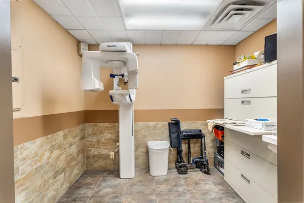 a kitchen with stainless steel appliances granite countertop a sink and cabinets
