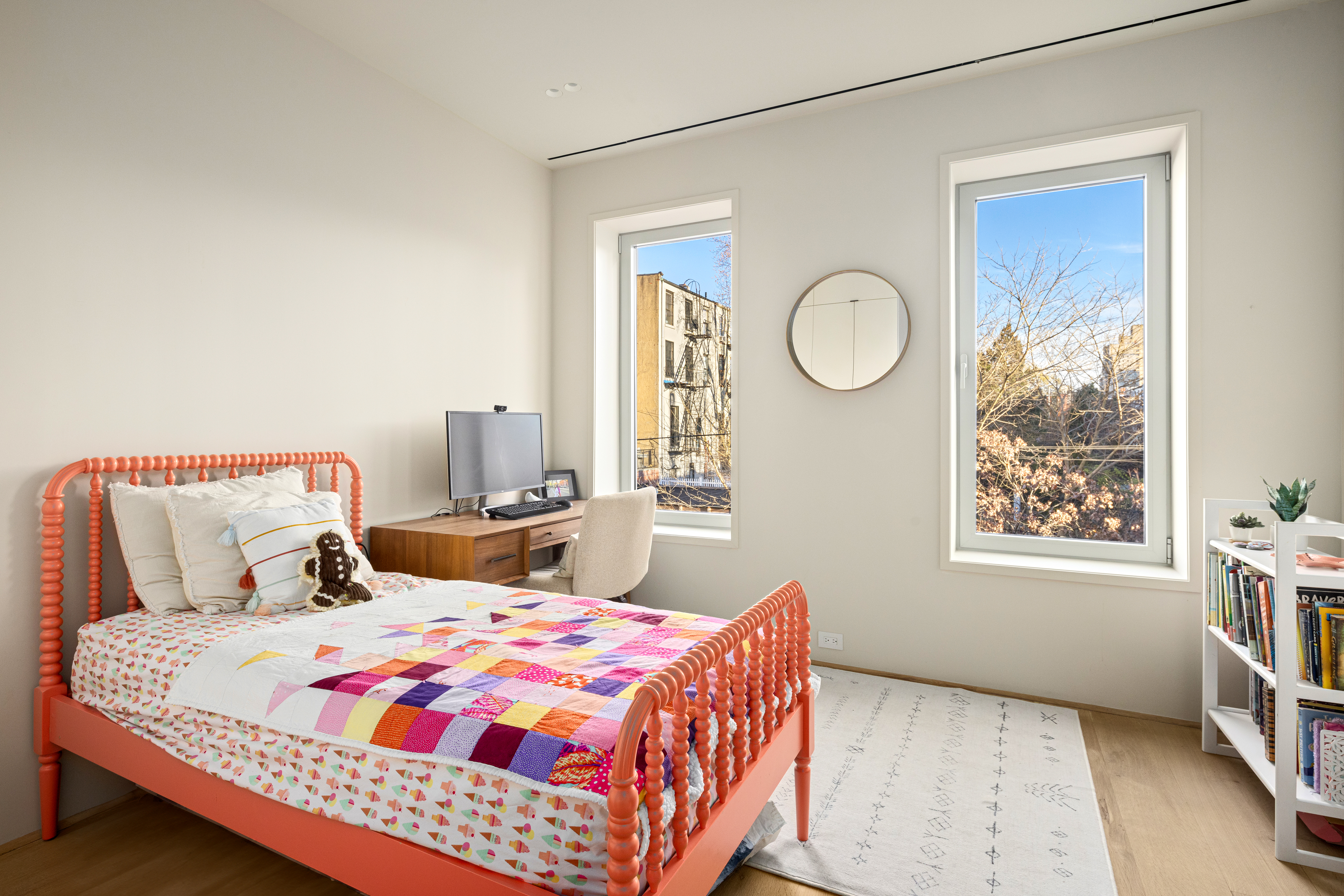 159 Hoyt Street Brooklyn, NY 11217 - Photo 9 of 18 a bedroom with a bed and a window