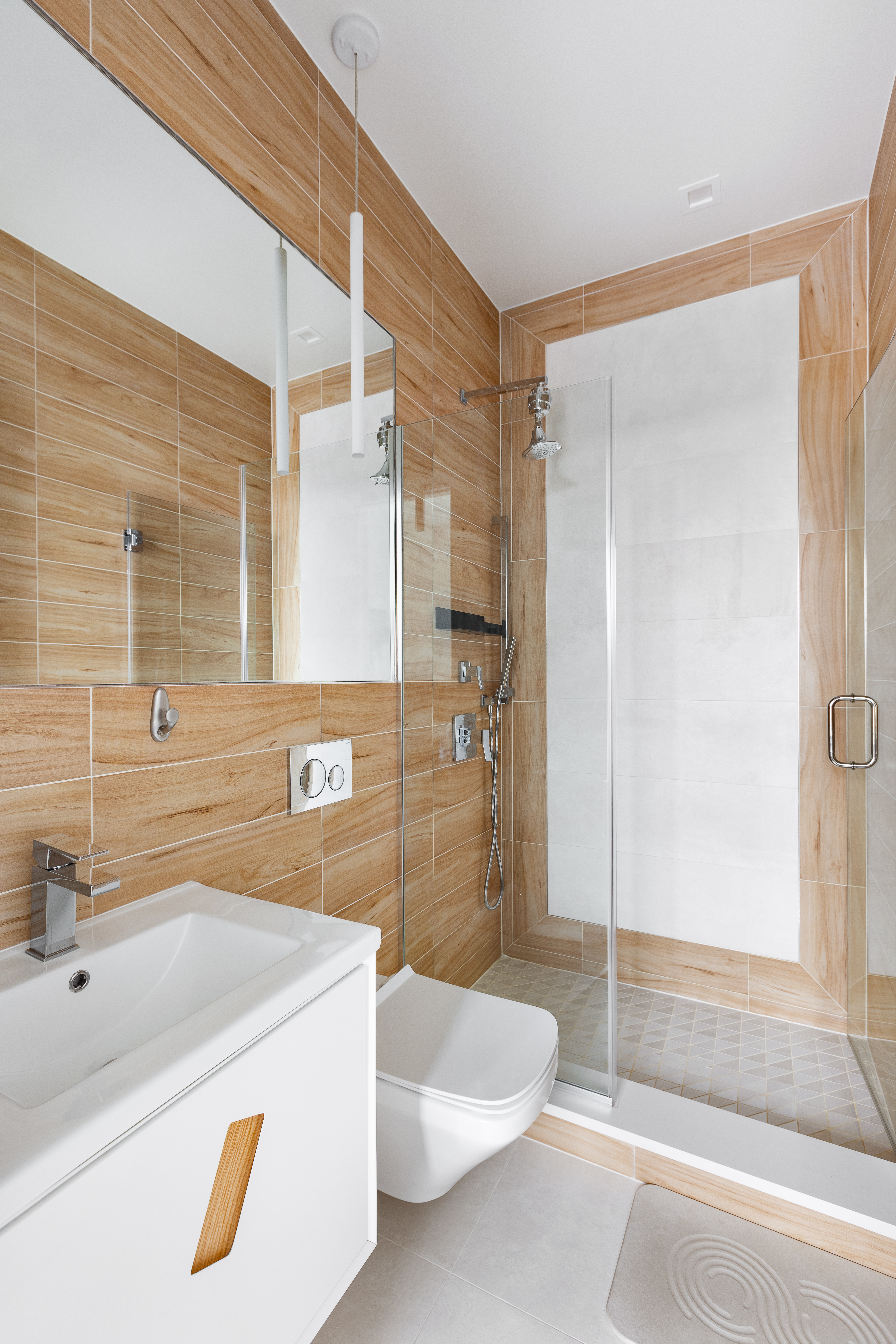 1122 Lafayette Avenue, Unit 4C Brooklyn, NY 11221 - Photo 7 of 14 a bathroom with a sink a toilet and shower
