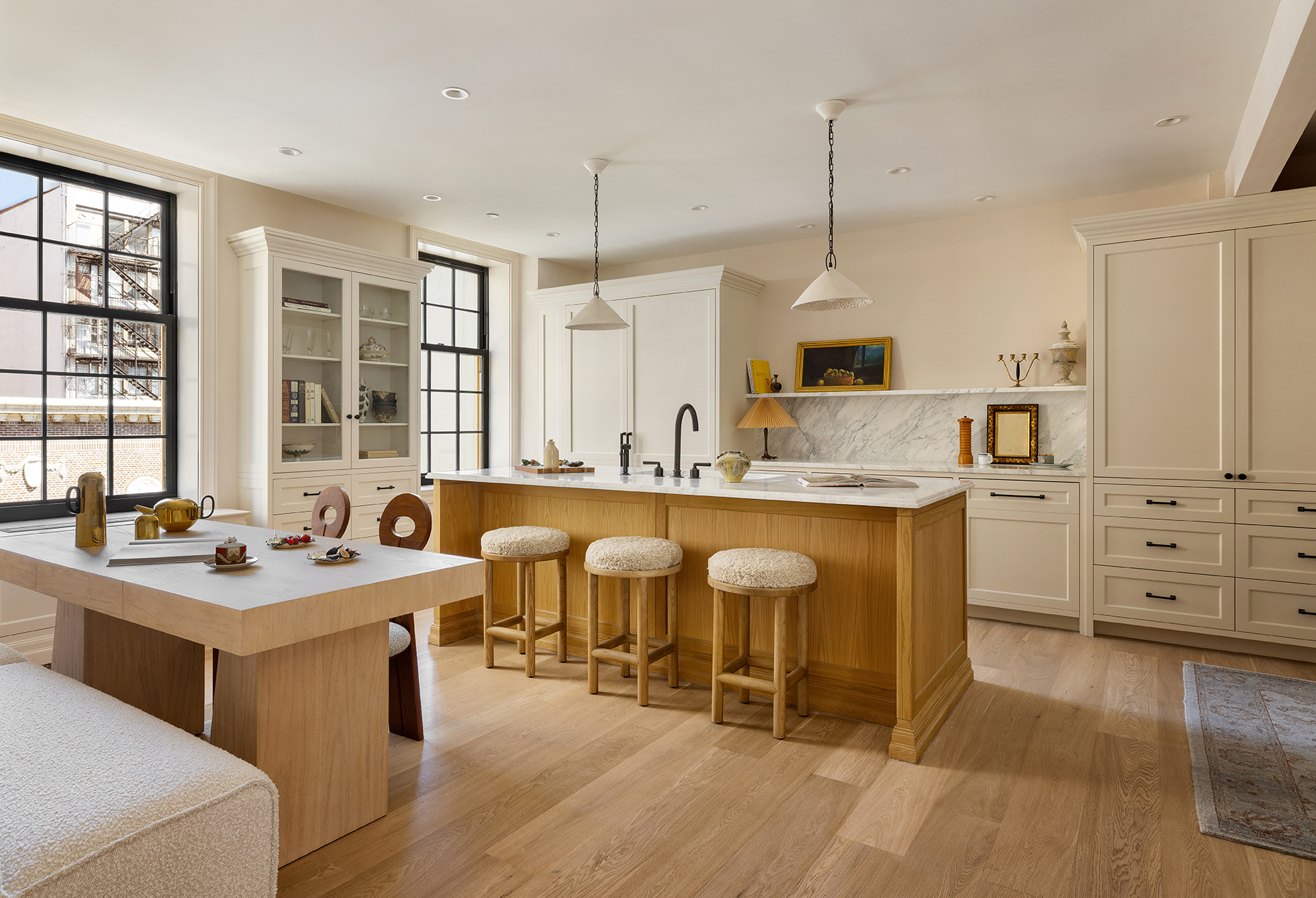 118 West 13th Street, Unit PH Manhattan, NY 10011 - Photo 11 of 31 a kitchen with stainless steel appliances granite countertop a sink stove and wooden floor