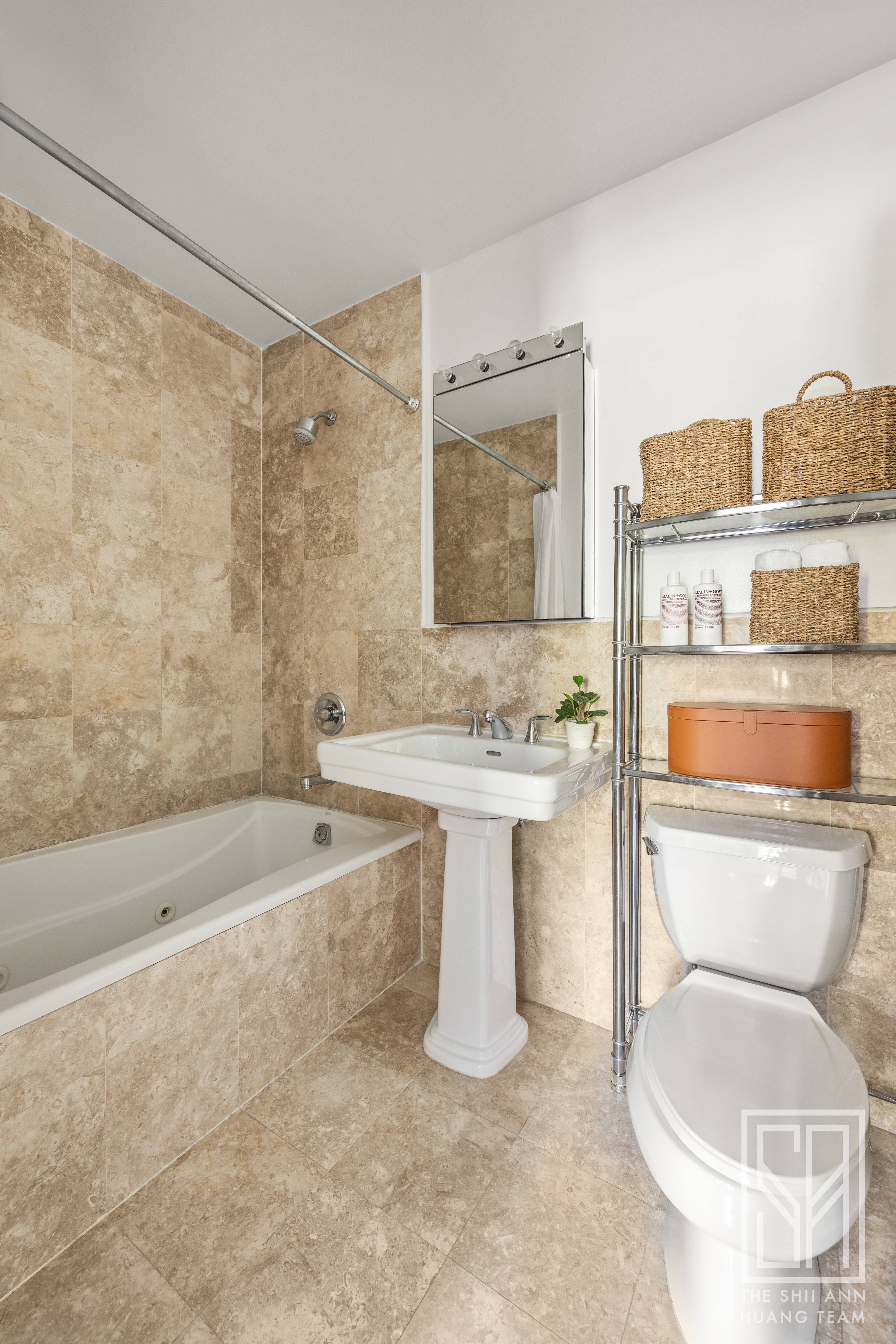 305 3rd Street, Unit 2H Brooklyn, NY 11215 - Photo 9 of 14 a bathroom with a sink toilet and shower