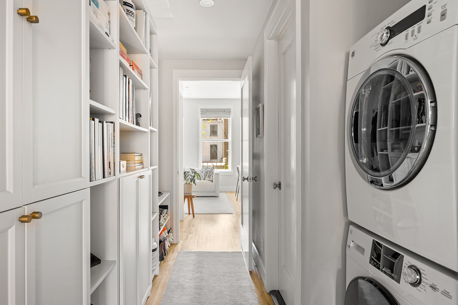 230 Baltic Street, Unit 2 Brooklyn, NY 11201 - Photo 4 of 11 a view of a hallway with washer and dryer