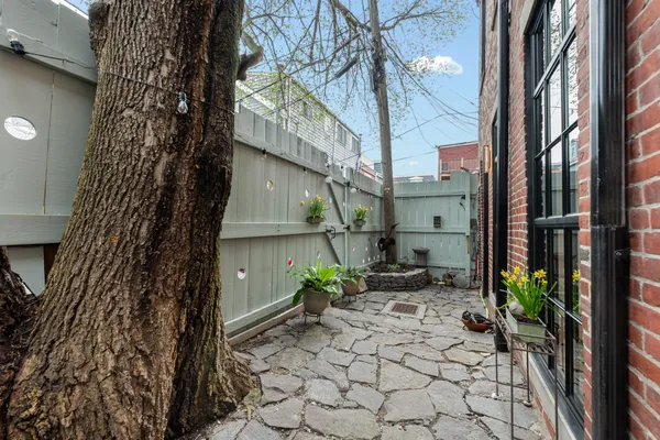 a view of yard with seating space
