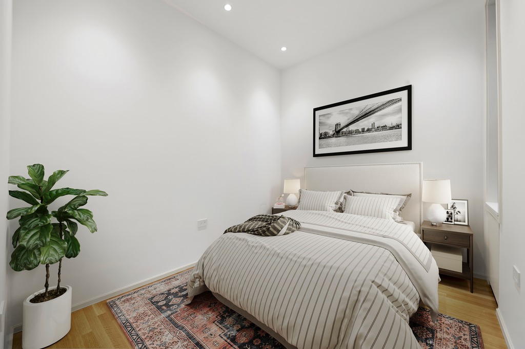 214 Clinton Street, Unit 2E Brooklyn, NY 11201 - Photo 8 of 11 a bedroom with a bed and a potted plant