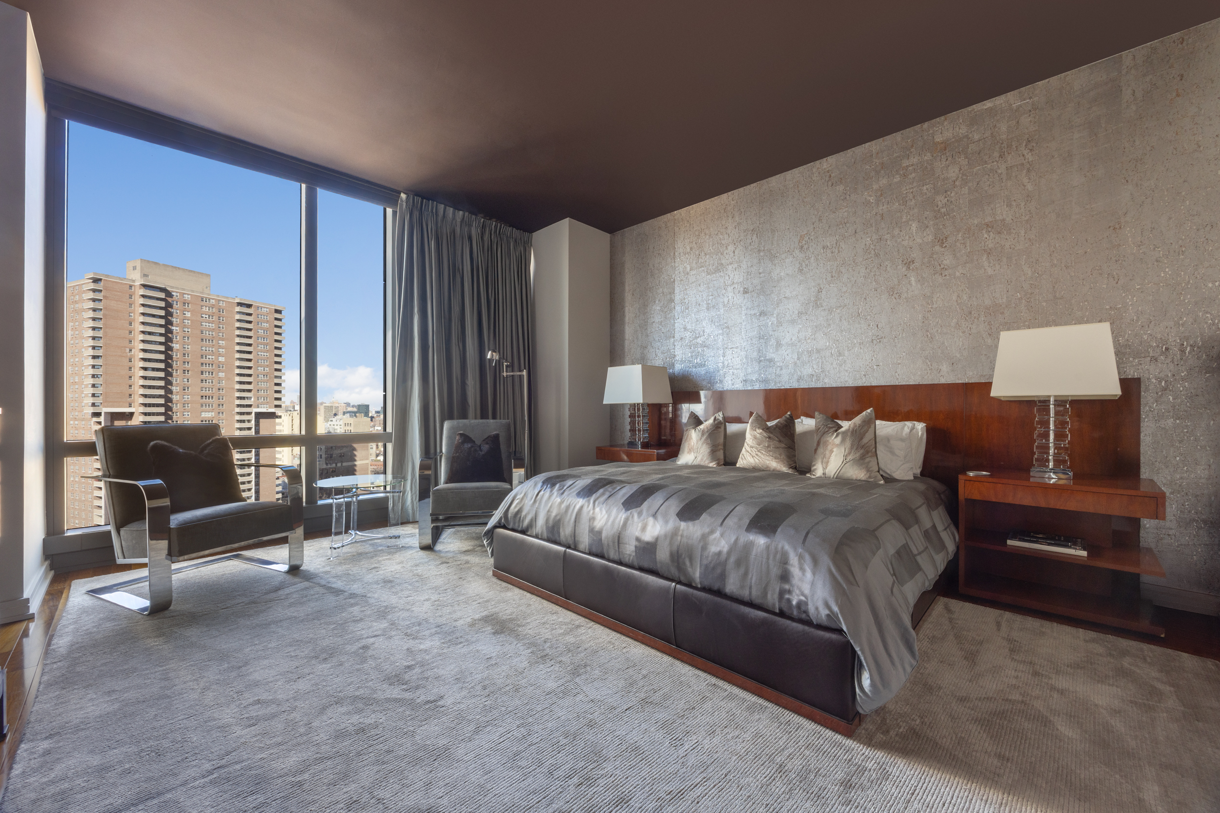 101 Warren Street, Unit 2220 Manhattan, NY 10007 - Photo 6 of 19 a spacious bedroom with a bed and large windows