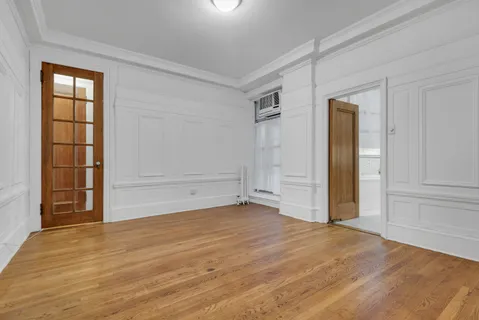 a view of an empty room and window