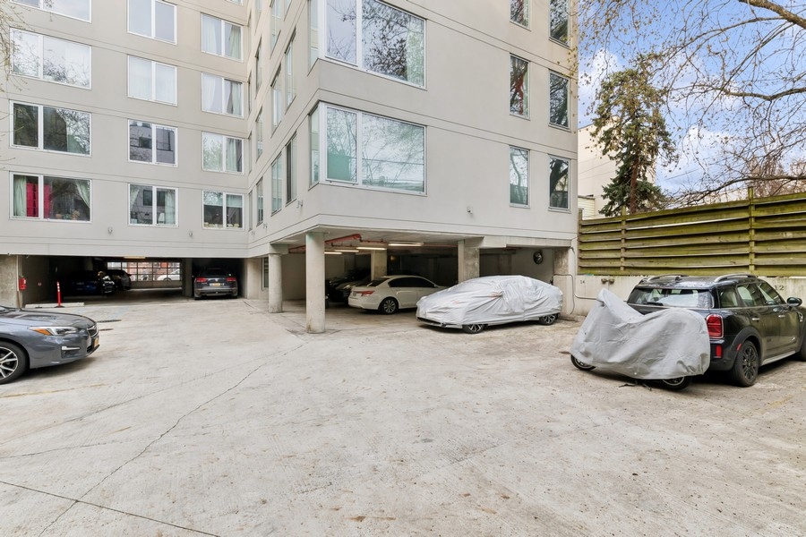 954 Bergen Street, Unit 4F Brooklyn, NY 11216 - Photo 9 of 11 a car parked in front of a building