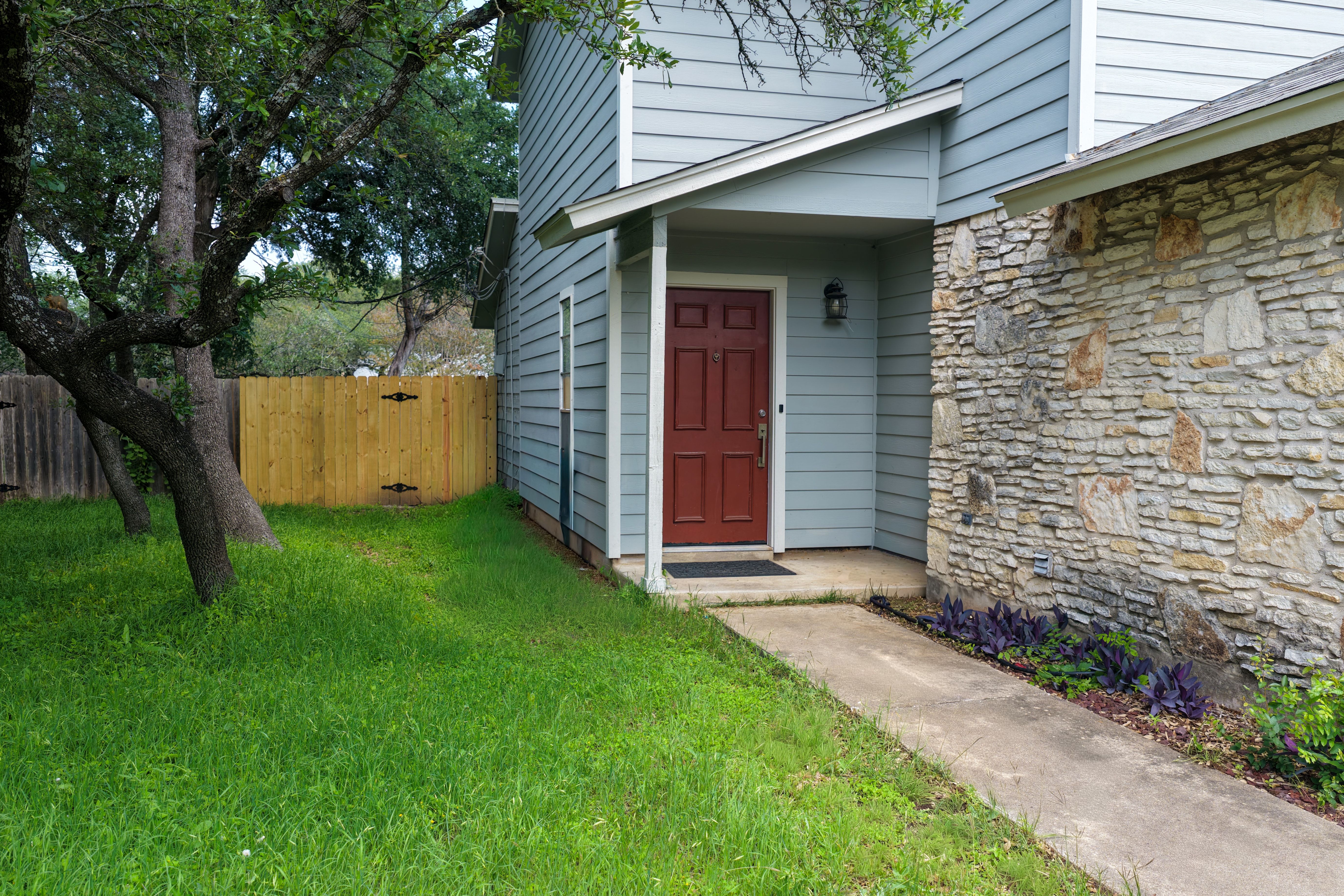 8710 Clearbrook Trail Austin, TX 78729 - Photo 16 of 28 a view of house with backyard