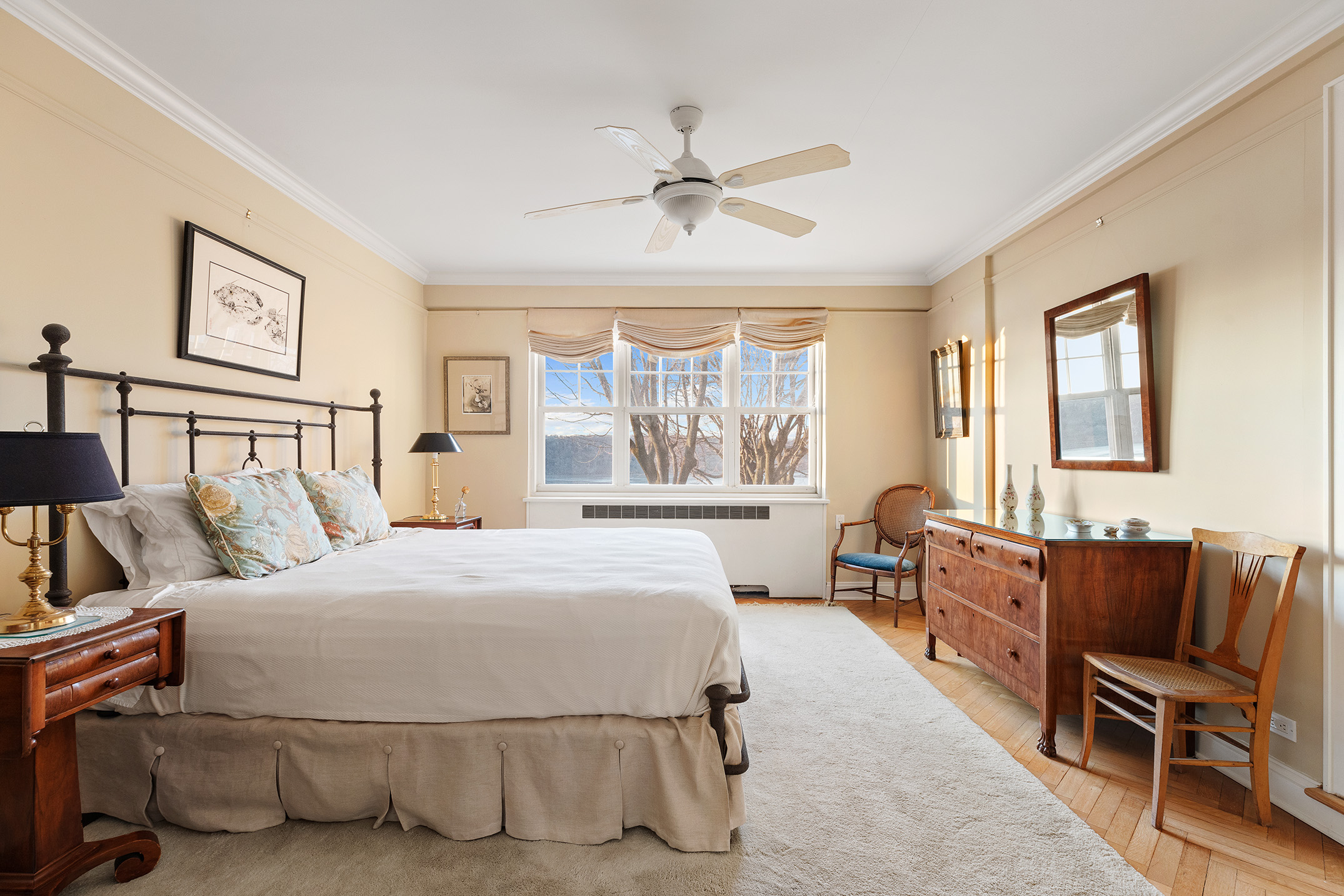 140 Cabrini Boulevard, Unit 18/19 Manhattan, NY 10033 - Photo 9 of 21 a bedroom with a bed and wooden floor