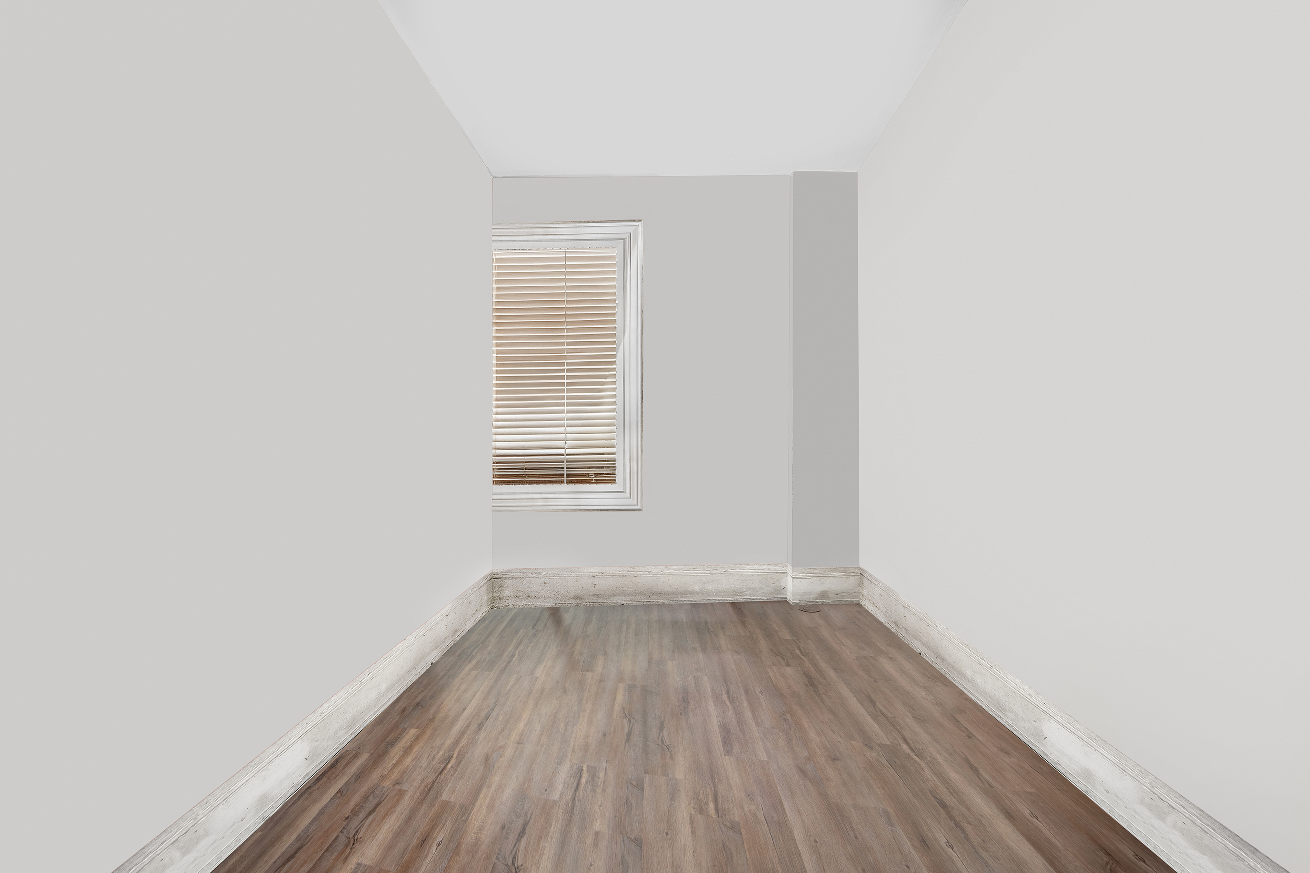 525 Park Avenue, Unit 3D Manhattan, NY 10065 - Photo 6 of 9 a view of a small space with wooden floor and a window