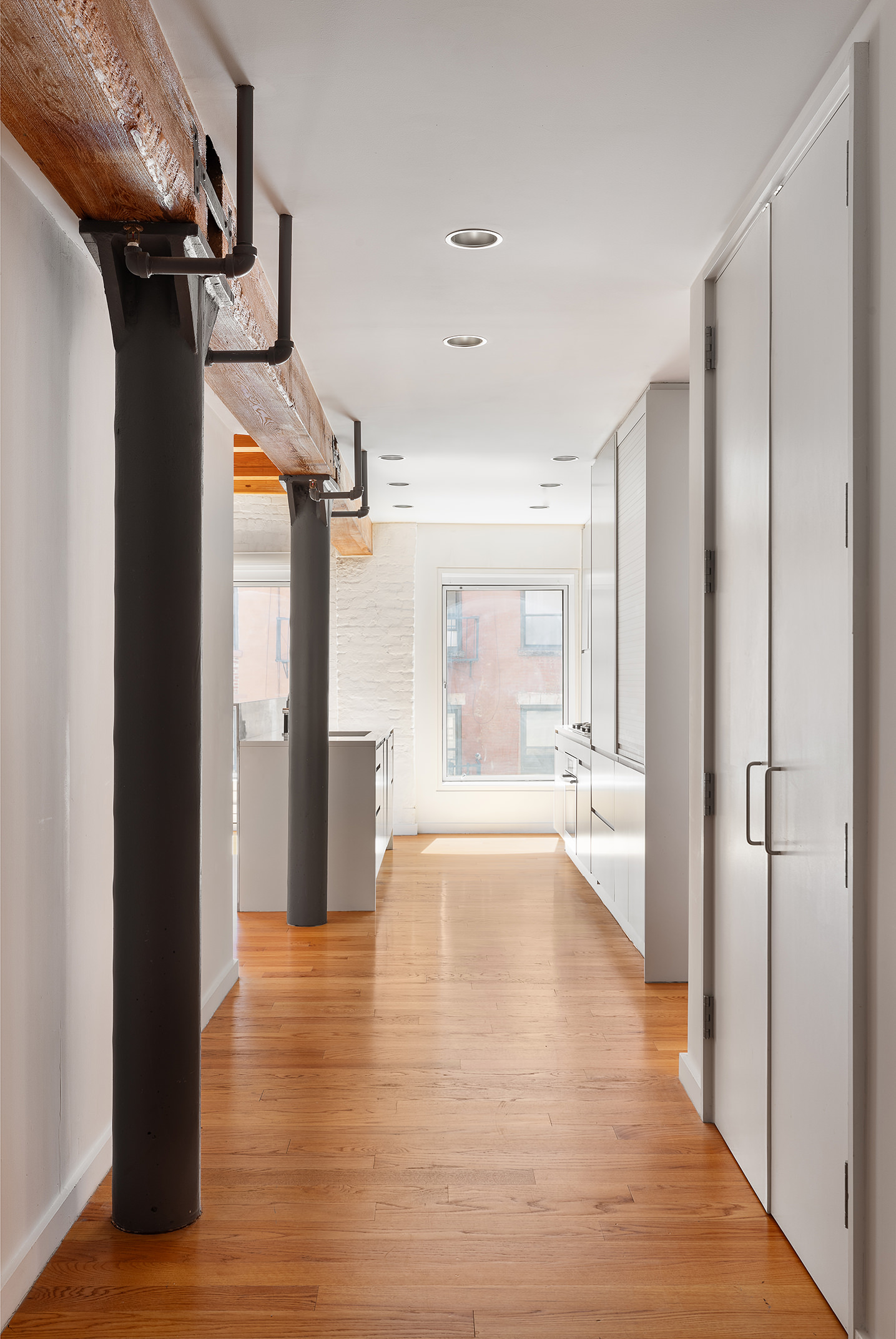 136 Baxter Street, Unit 3C Manhattan, NY 10013 - Photo 14 of 15 a view of an empty room and window