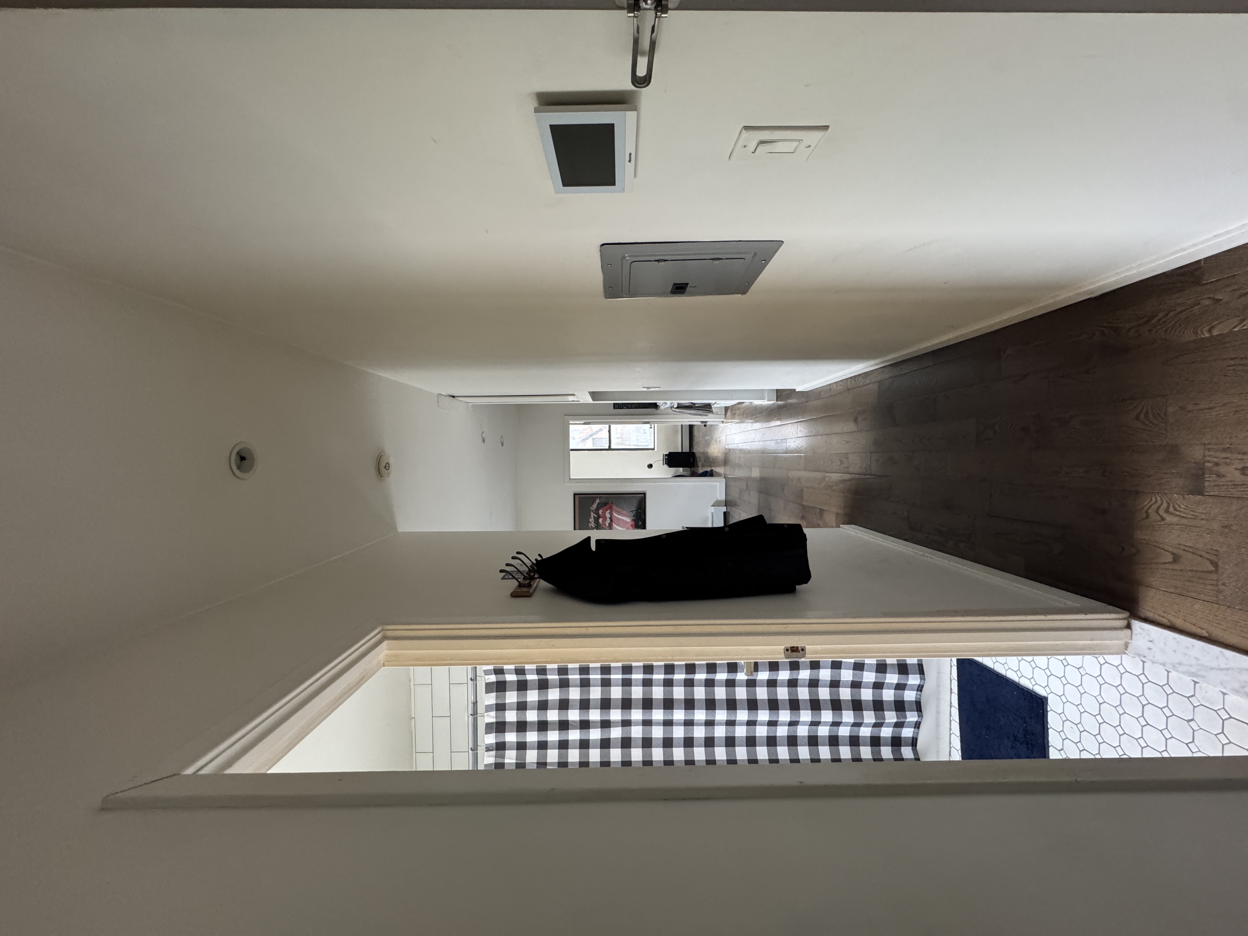 108 Stanton Street, Unit 1A Manhattan, NY 10002 - Photo 9 of 11 a view of a hallway with windows