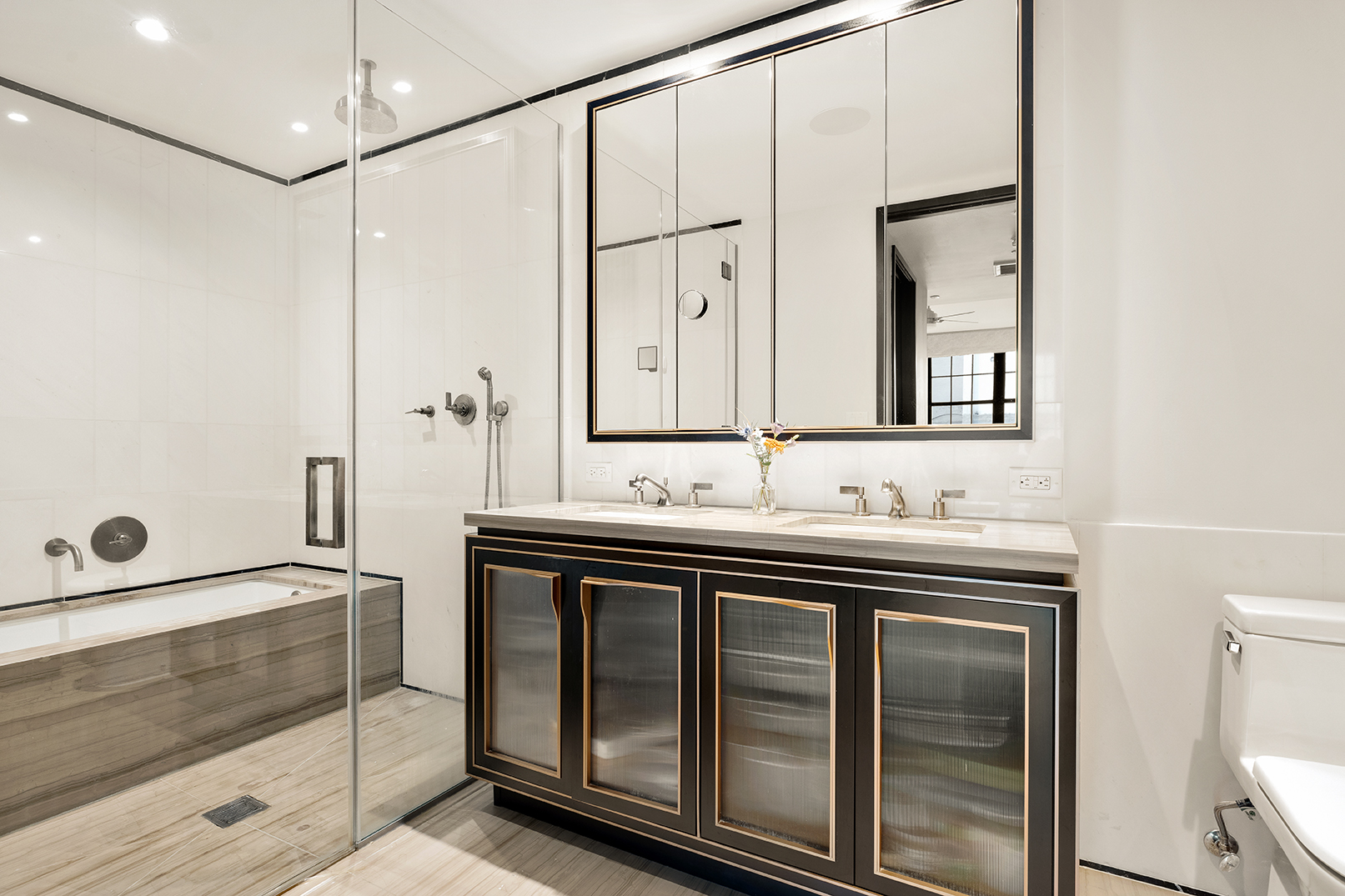 51 Jay Street, Unit 3C Brooklyn, NY 11201 - Photo 5 of 10 a bathroom with a sink and a mirror