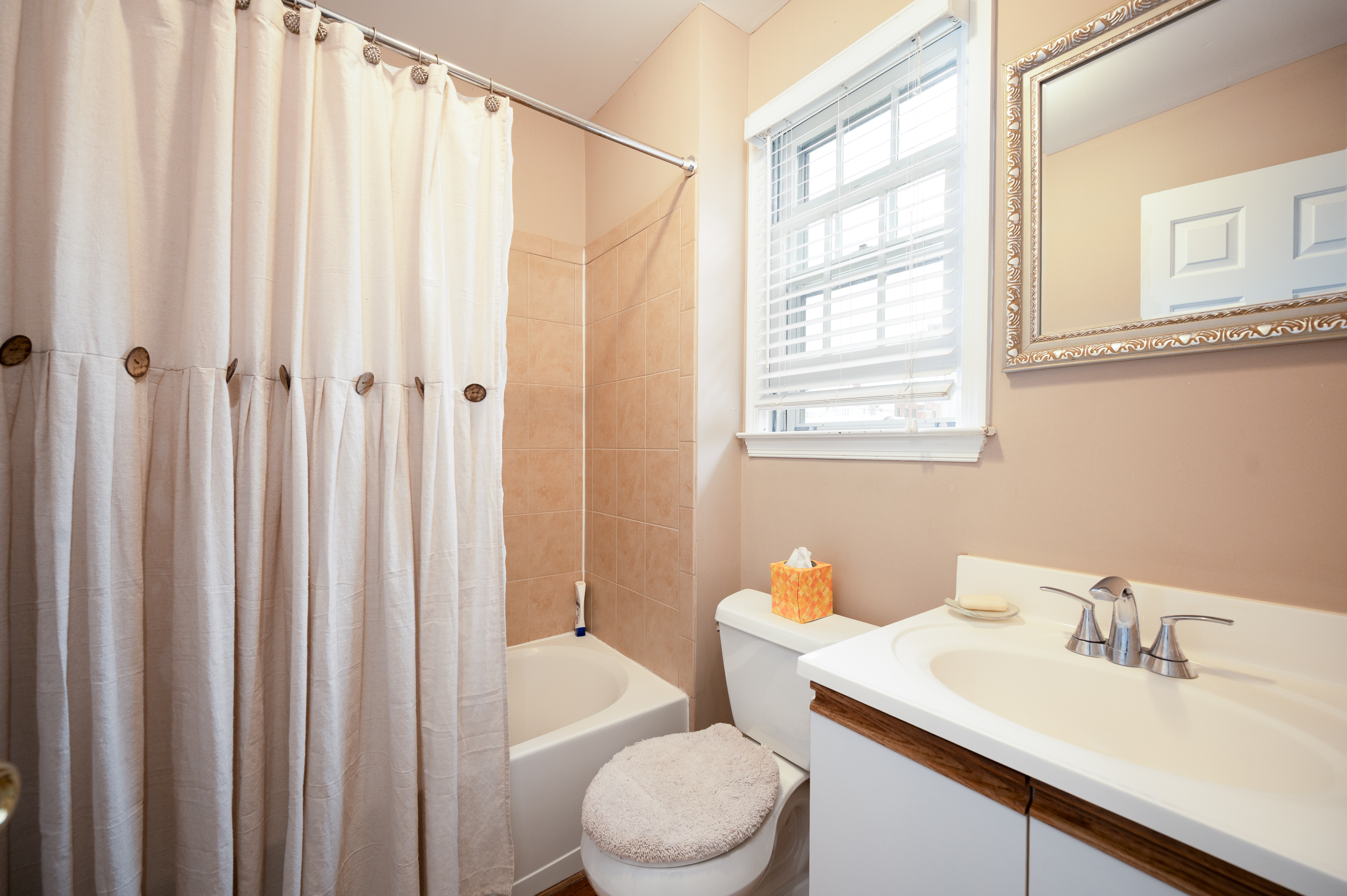 700 Blackshire Road Wilmington, DE 19805 - Photo 25 of 40 a bathroom with a sink vanity mirror and toilet