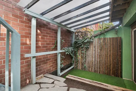 a yellow house with outdoor space