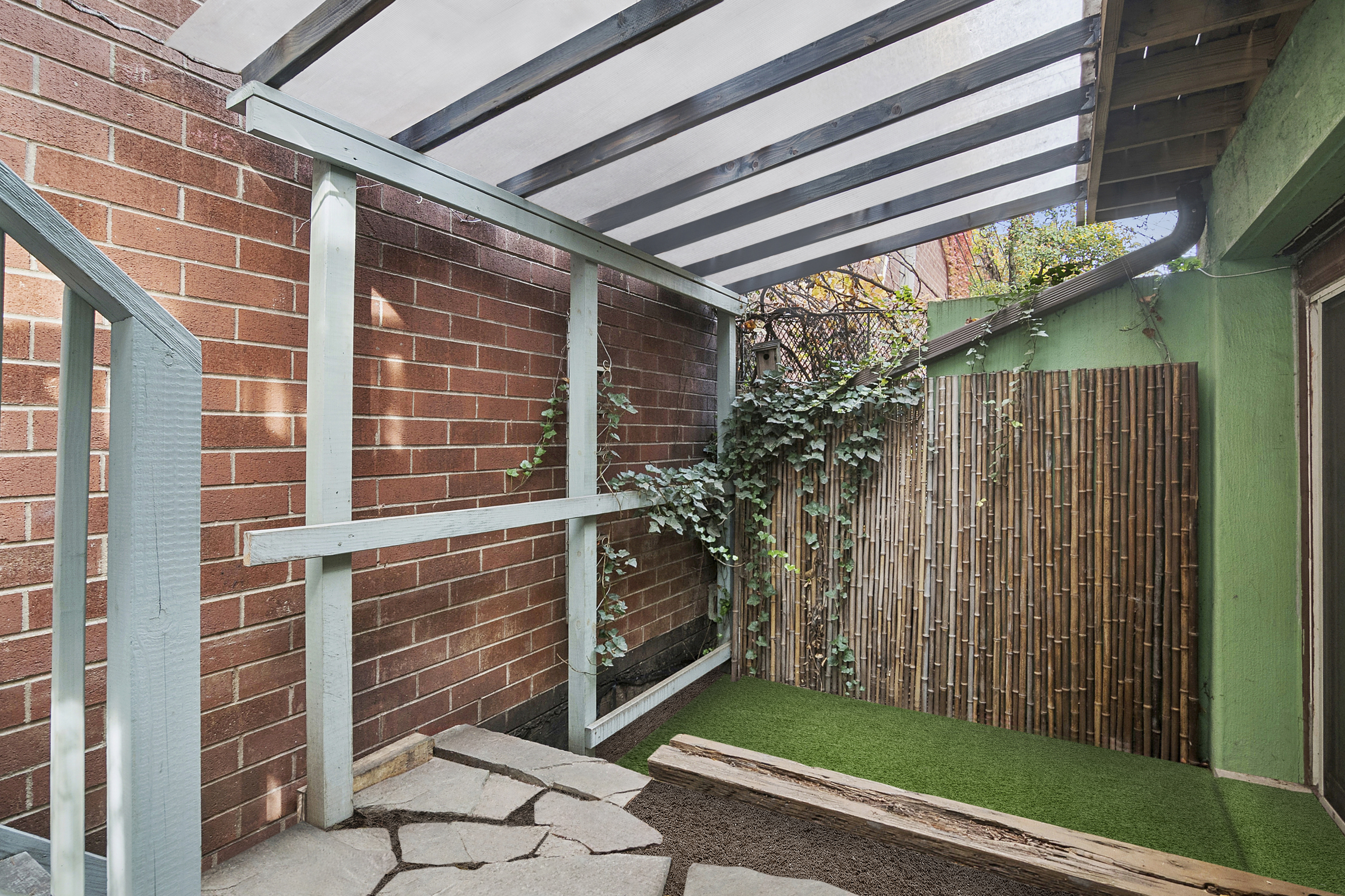 594 6th Avenue, Unit 1 Brooklyn, NY 11215 - Photo 11 of 13 a yellow house with outdoor space