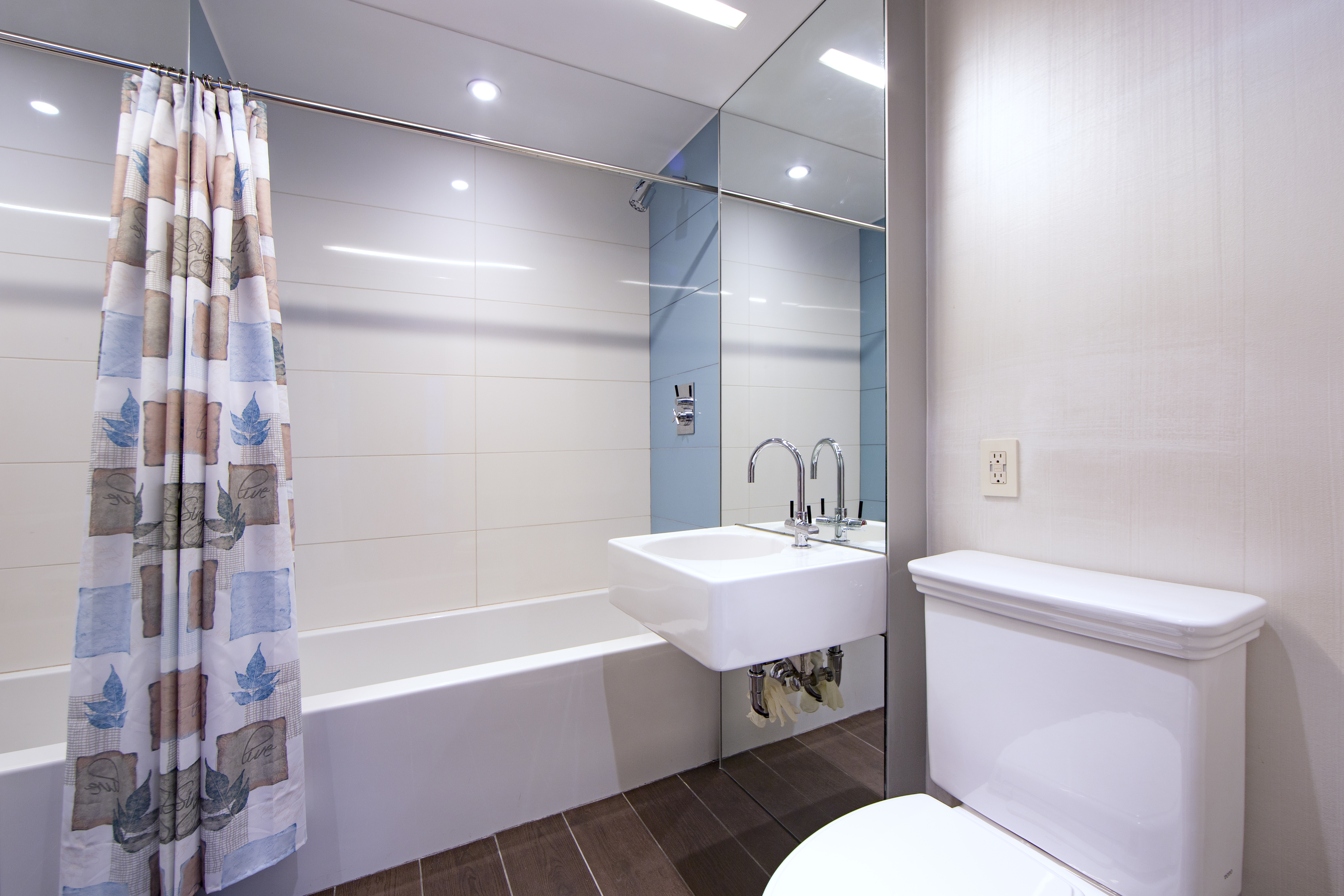 2 Northside Piers, Unit 27P Brooklyn, NY 11249 - Photo 12 of 19 a bathroom with a sink toilet tub and shower